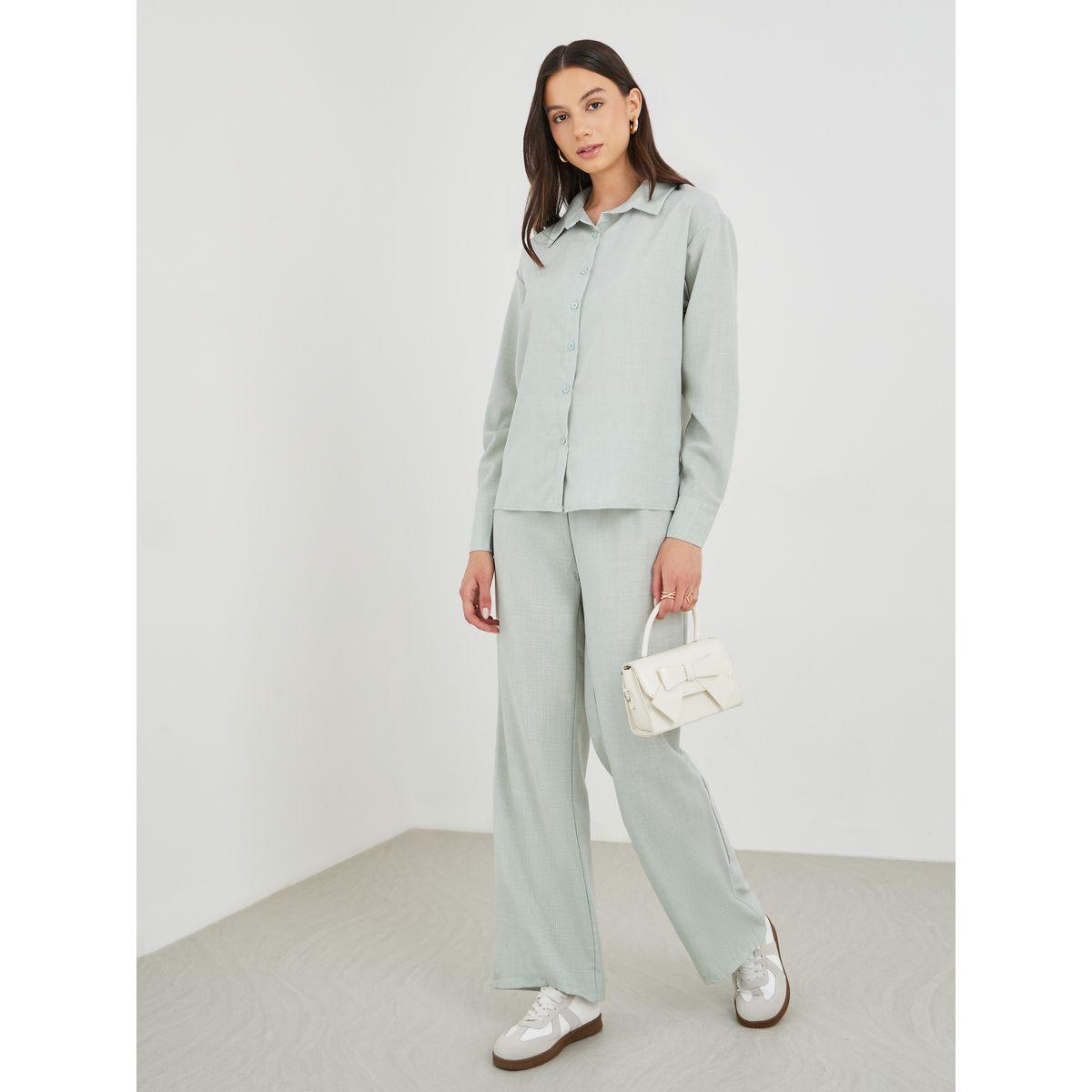 طقم منسق من بنطال بأرجل واسعة وبلوزة سادة-women-clothing-coordsets-image-1