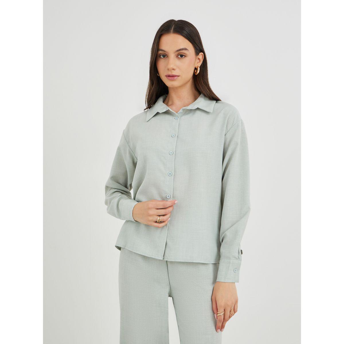 طقم منسق من بنطال بأرجل واسعة وبلوزة سادة-women-clothing-coordsets-image-2