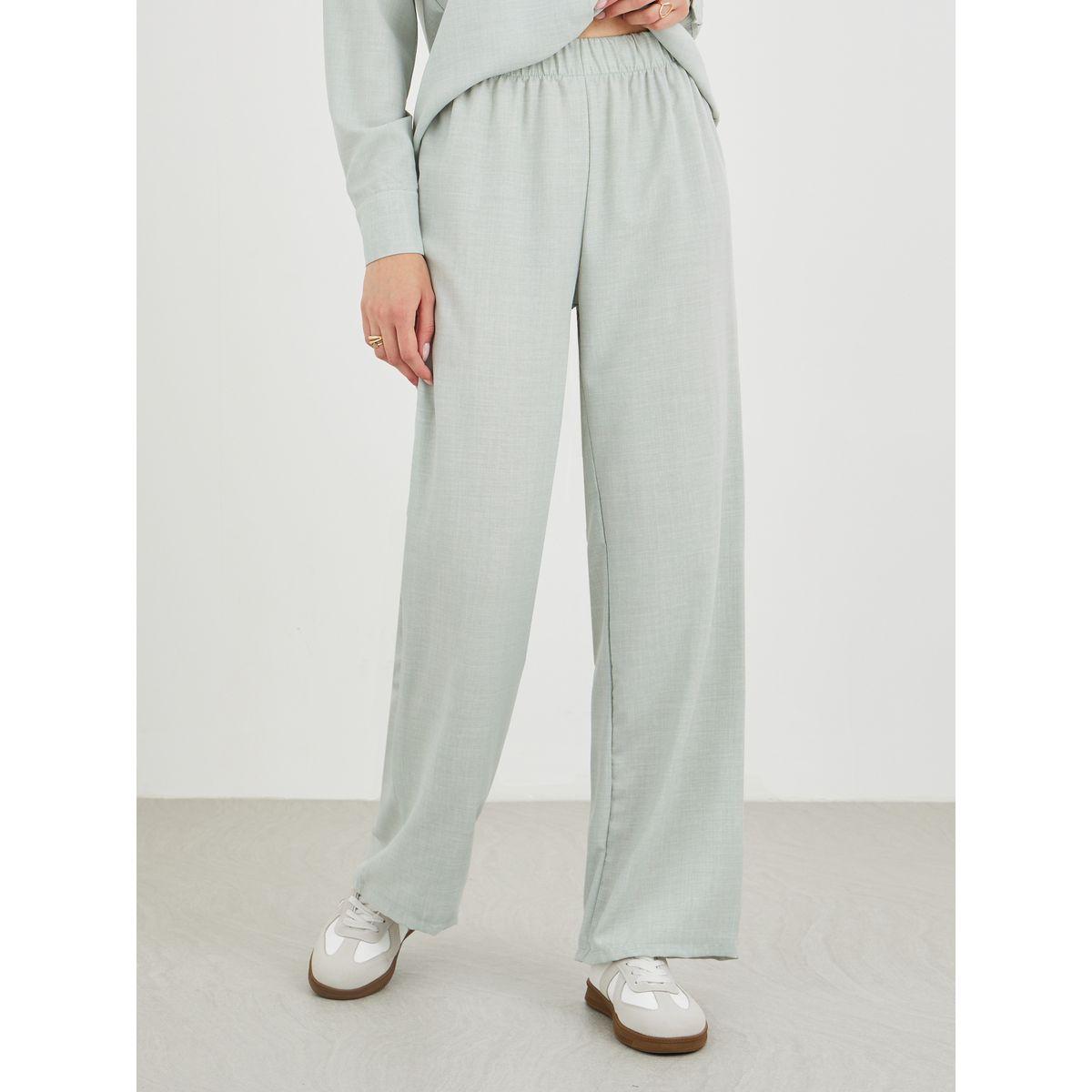 طقم منسق من بنطال بأرجل واسعة وبلوزة سادة-women-clothing-coordsets-image-5