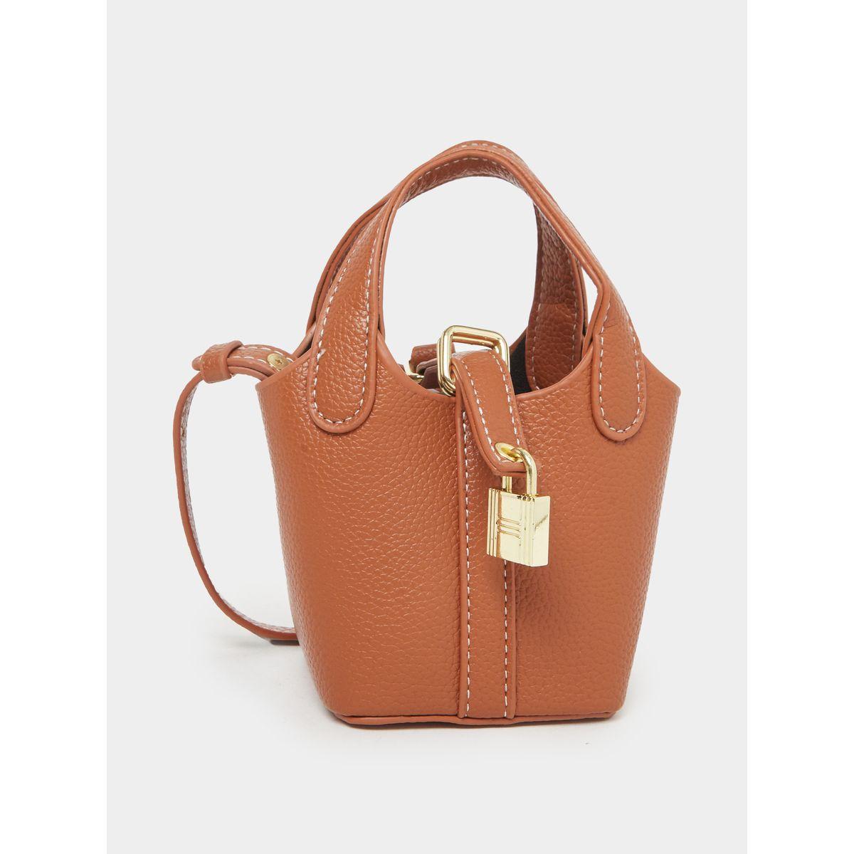 شنطة كروس بتفاصيل قفل مُتدلي-women-bagsandwallets-handbags-image-1