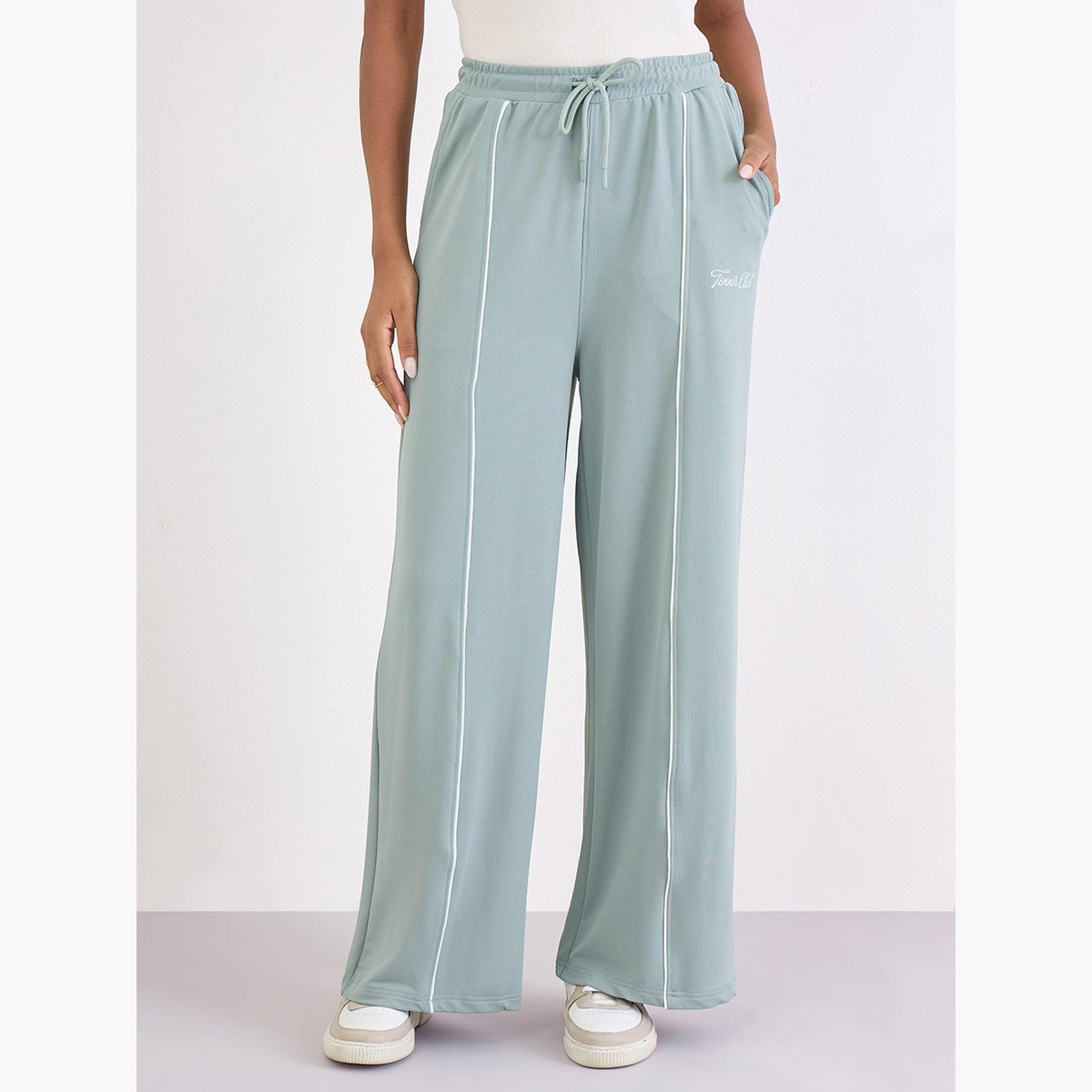 Styli Green Wide Leg Joggers with Piping Detail-women-clothing-bottoms-joggers-image-1