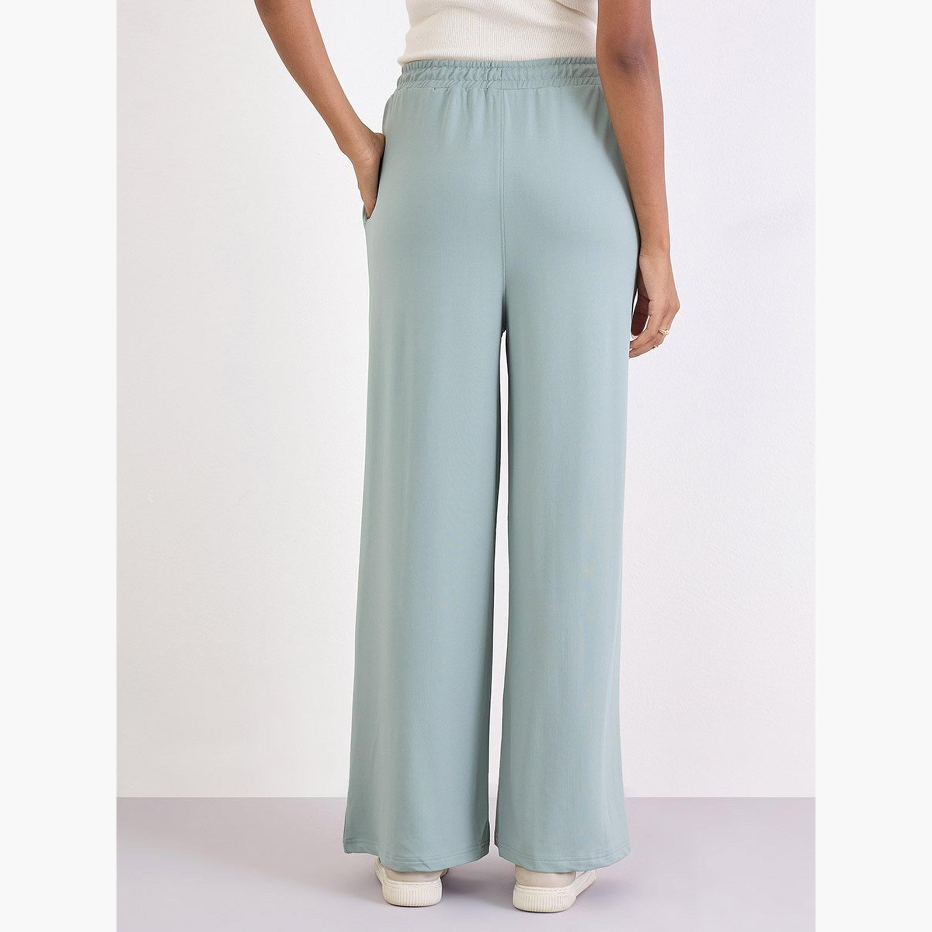 ستايلي - بنطال رياضي واسع الساق لون أخضر مع تفاصيل حواف-women-clothing-bottoms-joggers-image-4