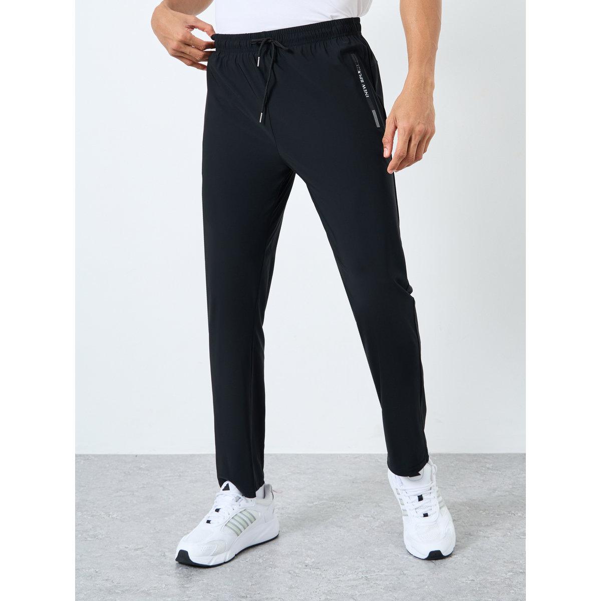 بنطال رياضي بحافة مفتوحة-men-clothing-sportswearandactivewear-bottoms-image-1