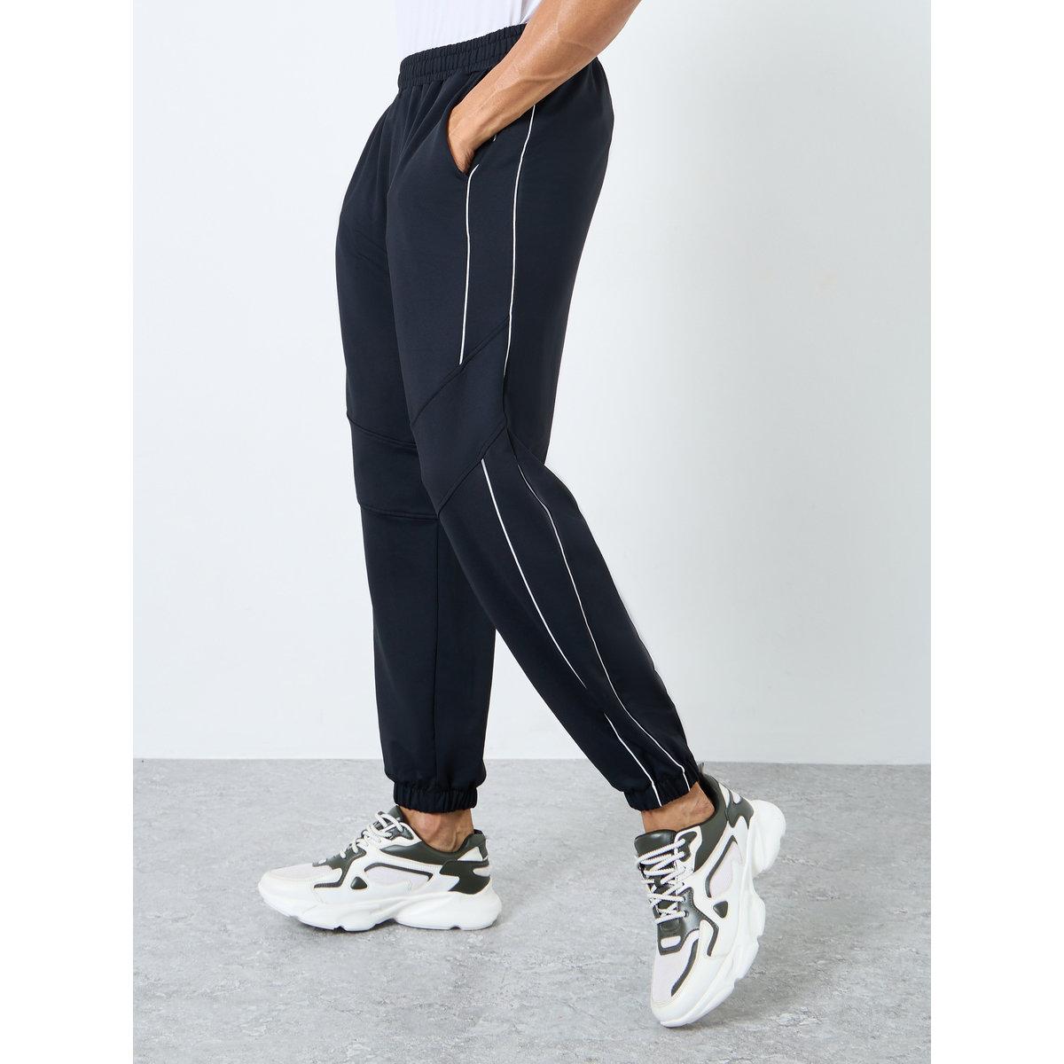بنطال رياضي بتفاصيل أنبوبية-men-clothing-sportswearandactivewear-bottoms-joggers-image-1