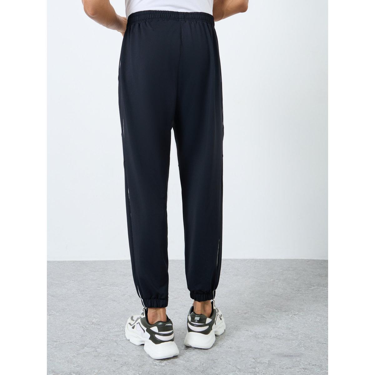 بنطال رياضي بتفاصيل أنبوبية-men-clothing-sportswearandactivewear-bottoms-joggers-image-4