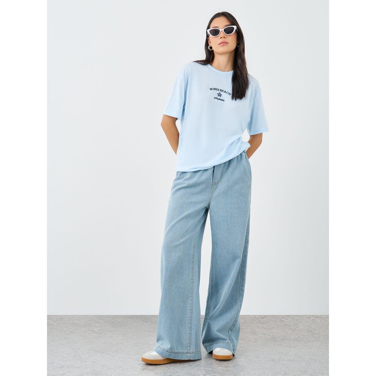 Styli Women Light Blue Bondi Beach Embroidered Oversized T-Shirt-women-clothing-tshirts-image-2