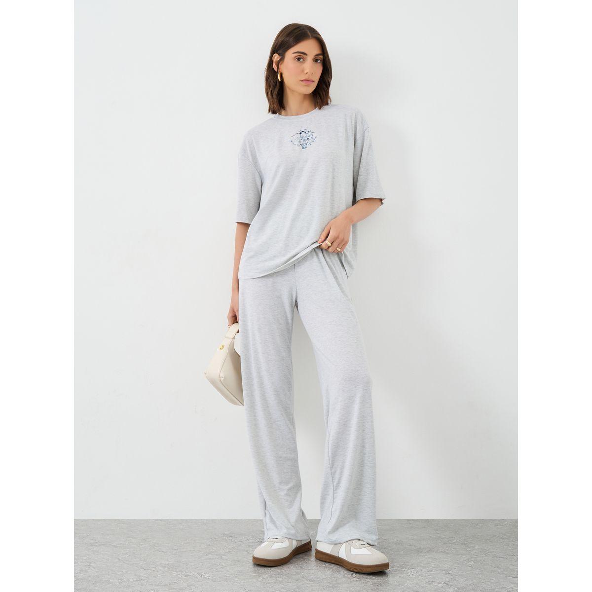 طقم منسق من جوغر وتيشيرت فضفاض بطبعة زهور-women-clothing-coordsets-image-1