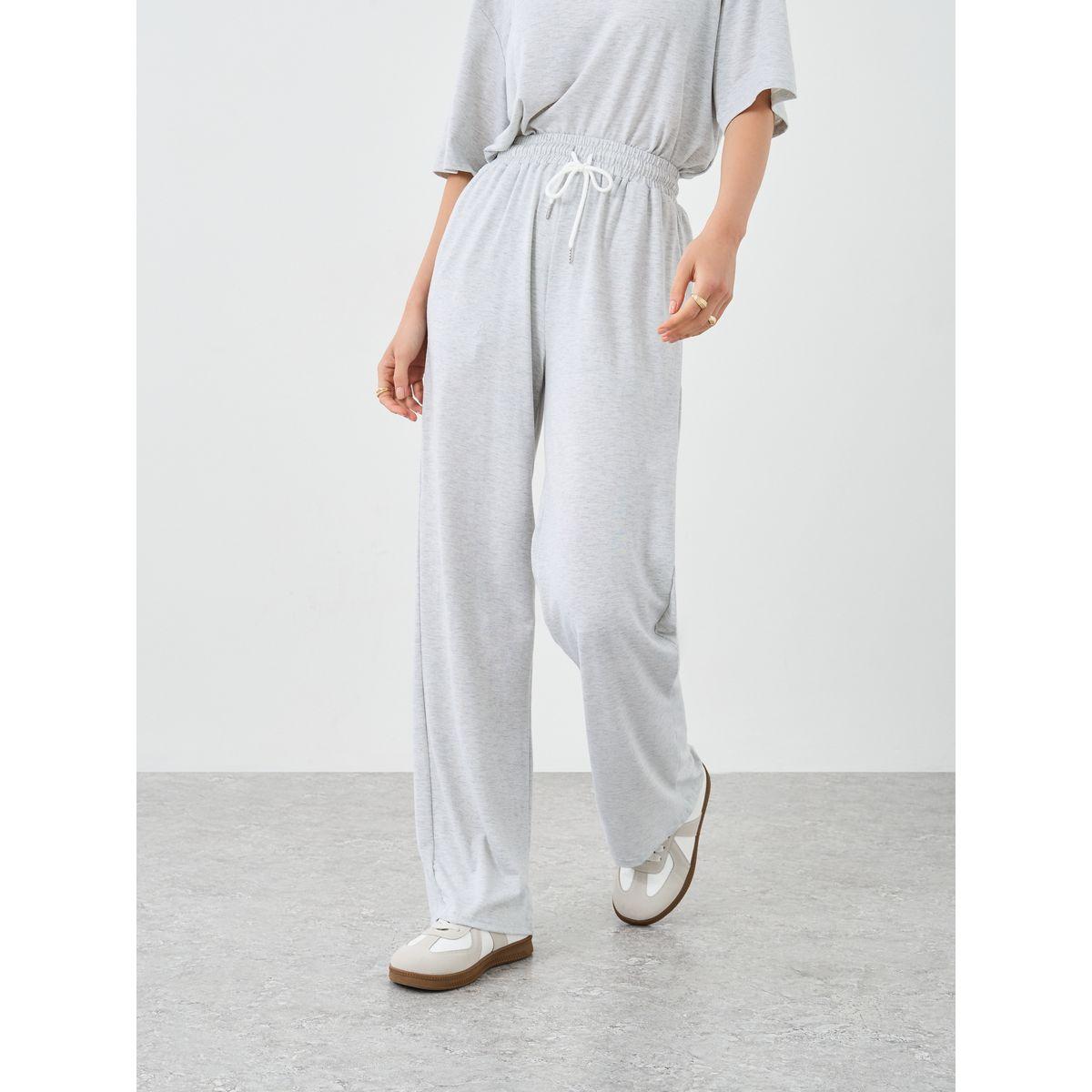 طقم منسق من جوغر وتيشيرت فضفاض بطبعة زهور-women-clothing-coordsets-image-5