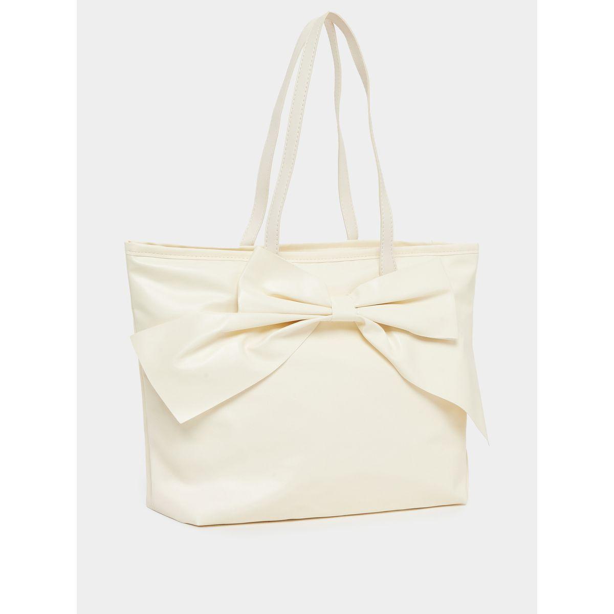 شنطة كبيرة بتفاصيل فيونكة-women-bagsandwallets-handbags-image-1