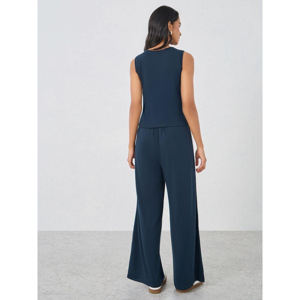 طقم منسق من بنطال وبلوزة بتفاصيل محزوزة-women-clothing-coordsets-image-5