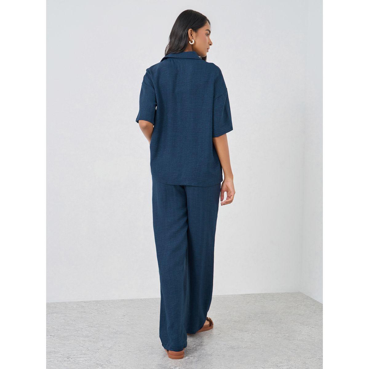 طقم منسق من بنطال وقميص بقصة مريحة وتفاصيل جيب-women-clothing-coordsets-image-5