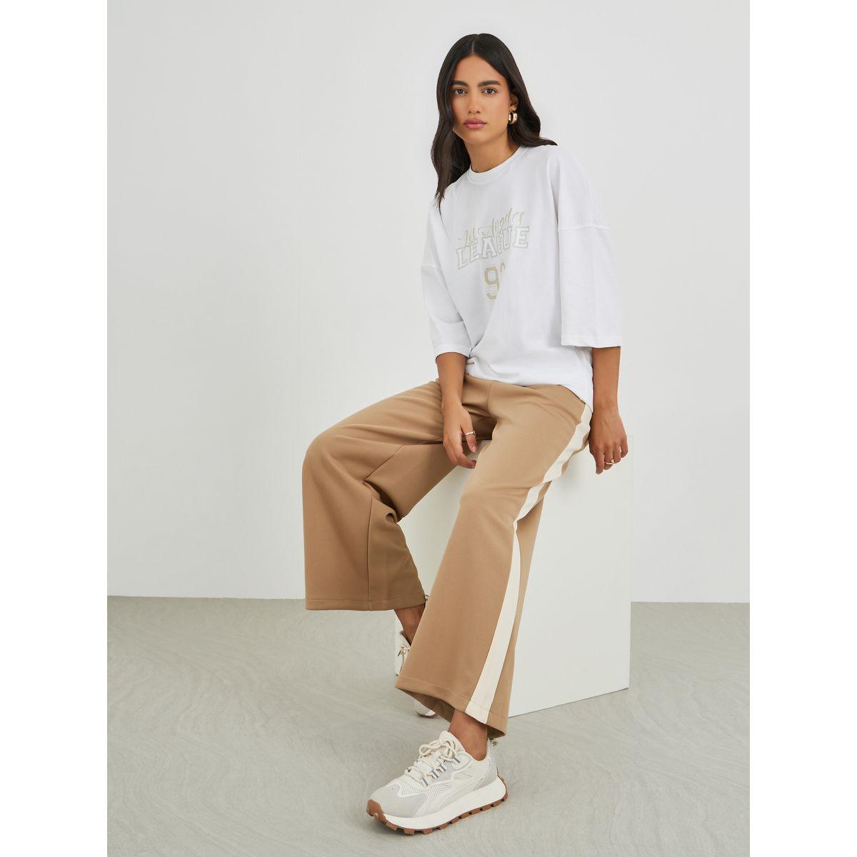 جوغر سكوبا بأرجل واسعة ودرزات جانبية-women-clothing-bottoms-joggers-image-1