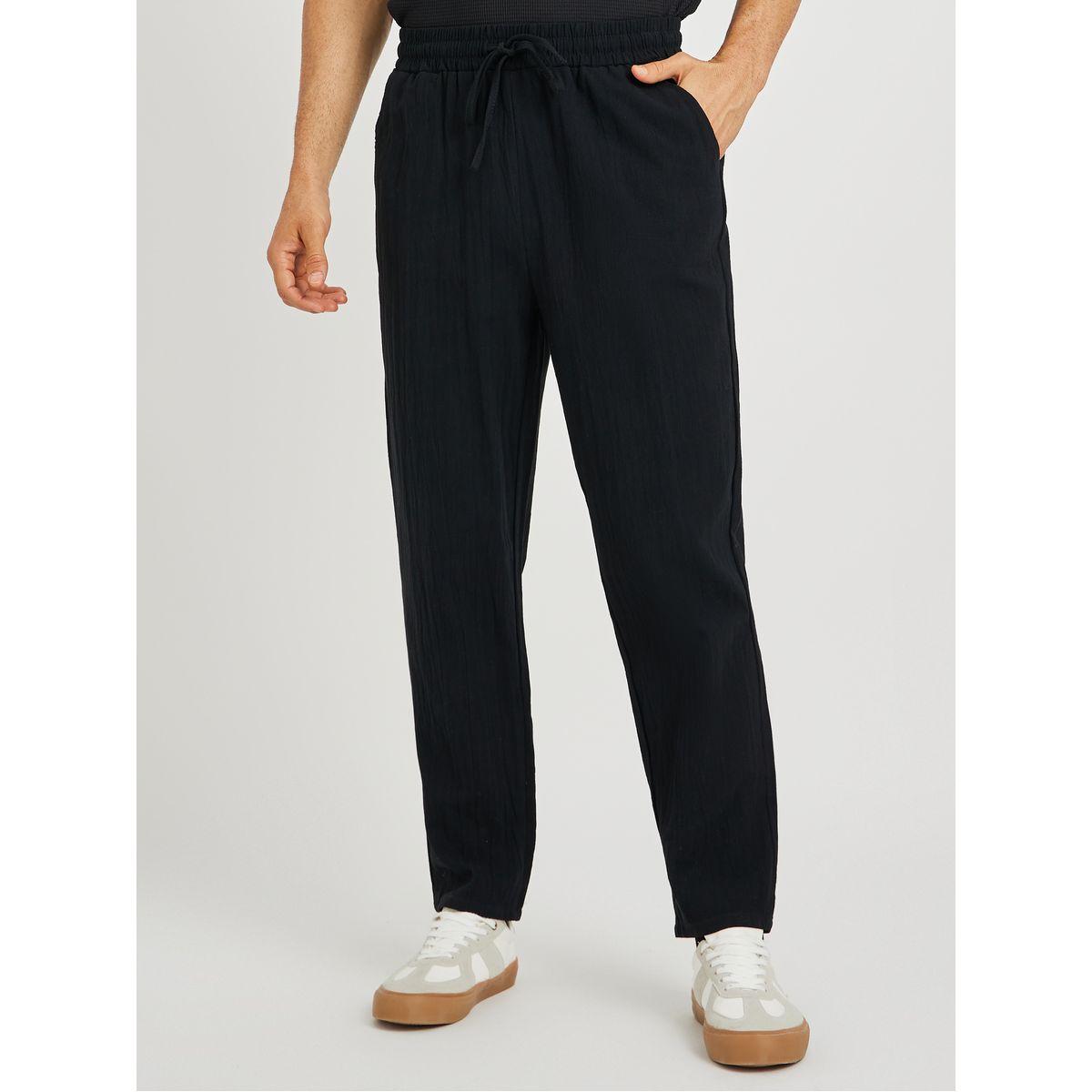 Styli Men Black Solid Drawstring Waist Pocket Detail Relaxed Fit Pants-men-clothing-bottoms-joggers-image-1
