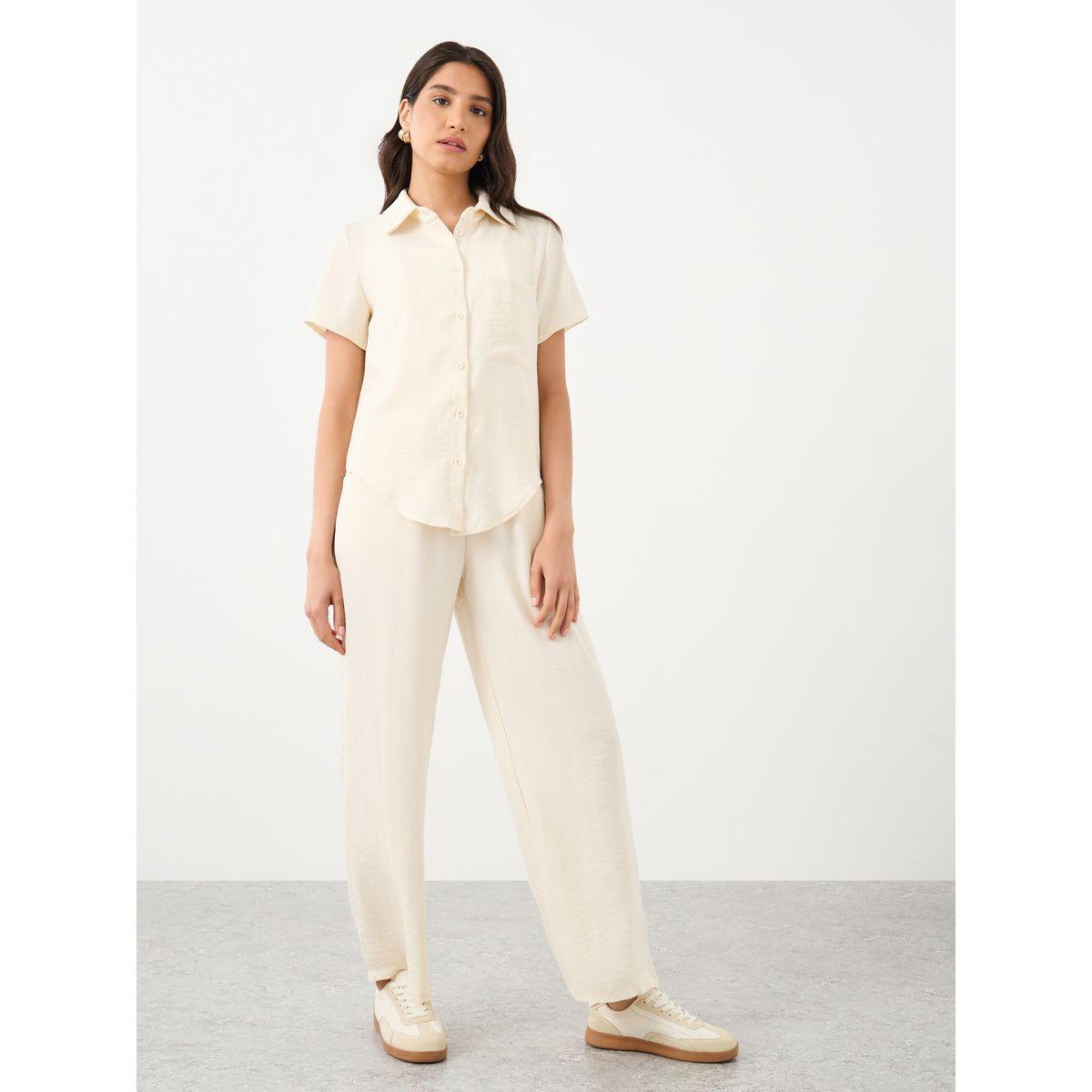 طقم منسق من بنطال بقصة أرجل مستقيمة وبلوزة سادة-women-clothing-coordsets-image-2