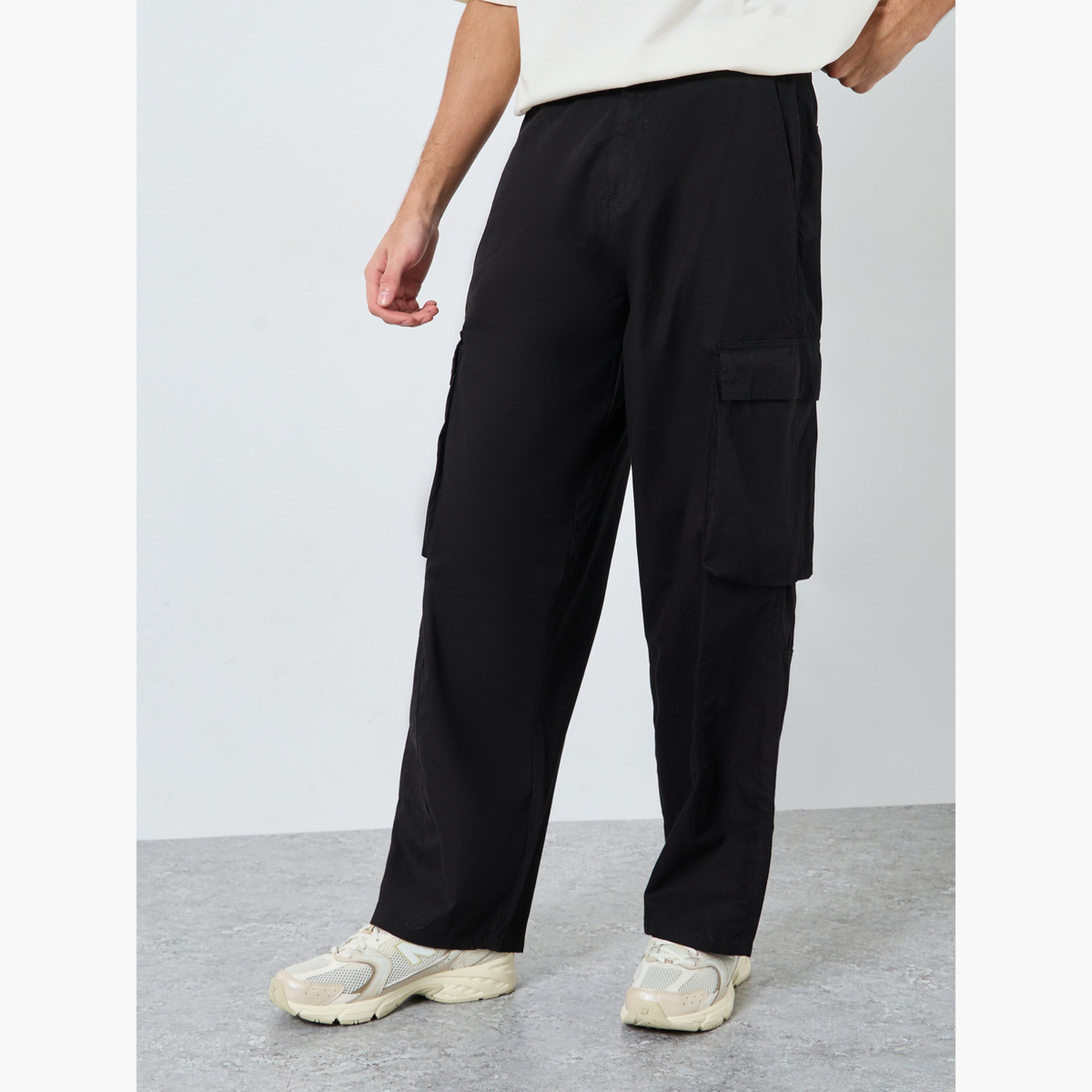 ستايلي - بنطال كارغو تصميم واسع بجيوب للرجال-men-clothing-bottoms-joggers-image-1