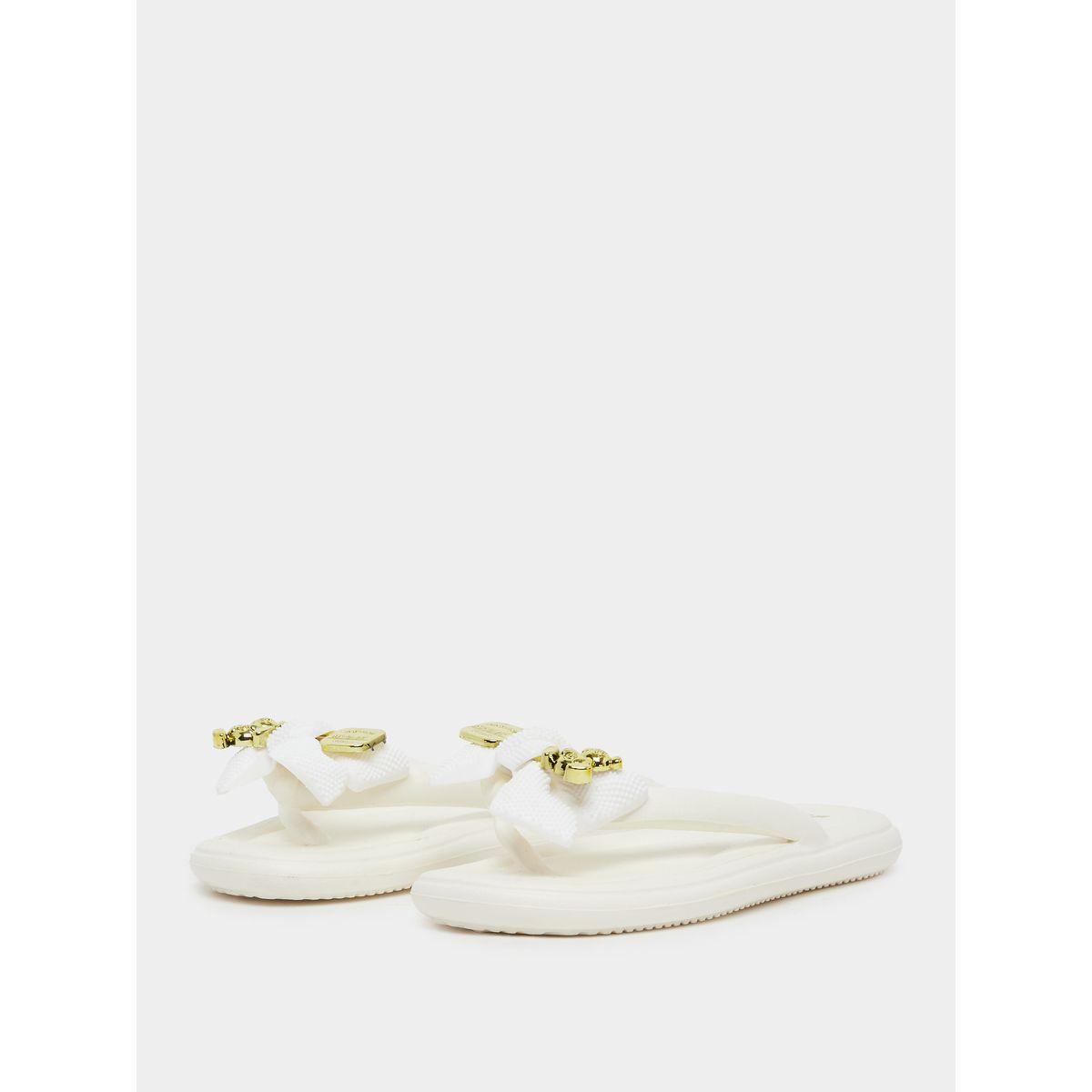 شبشب مُنمق بتفاصيل فيونكة-women-shoes-flipflopsandslides-image-2
