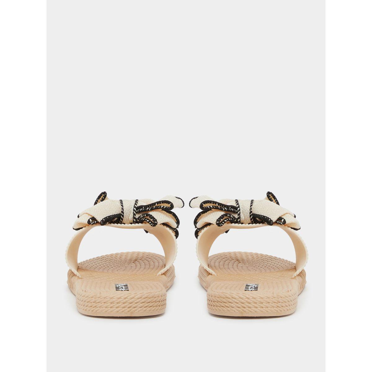 شبشب بتفاصيل مُتباينة وربطة فيونكة-women-shoes-flipflopsandslides-image-4