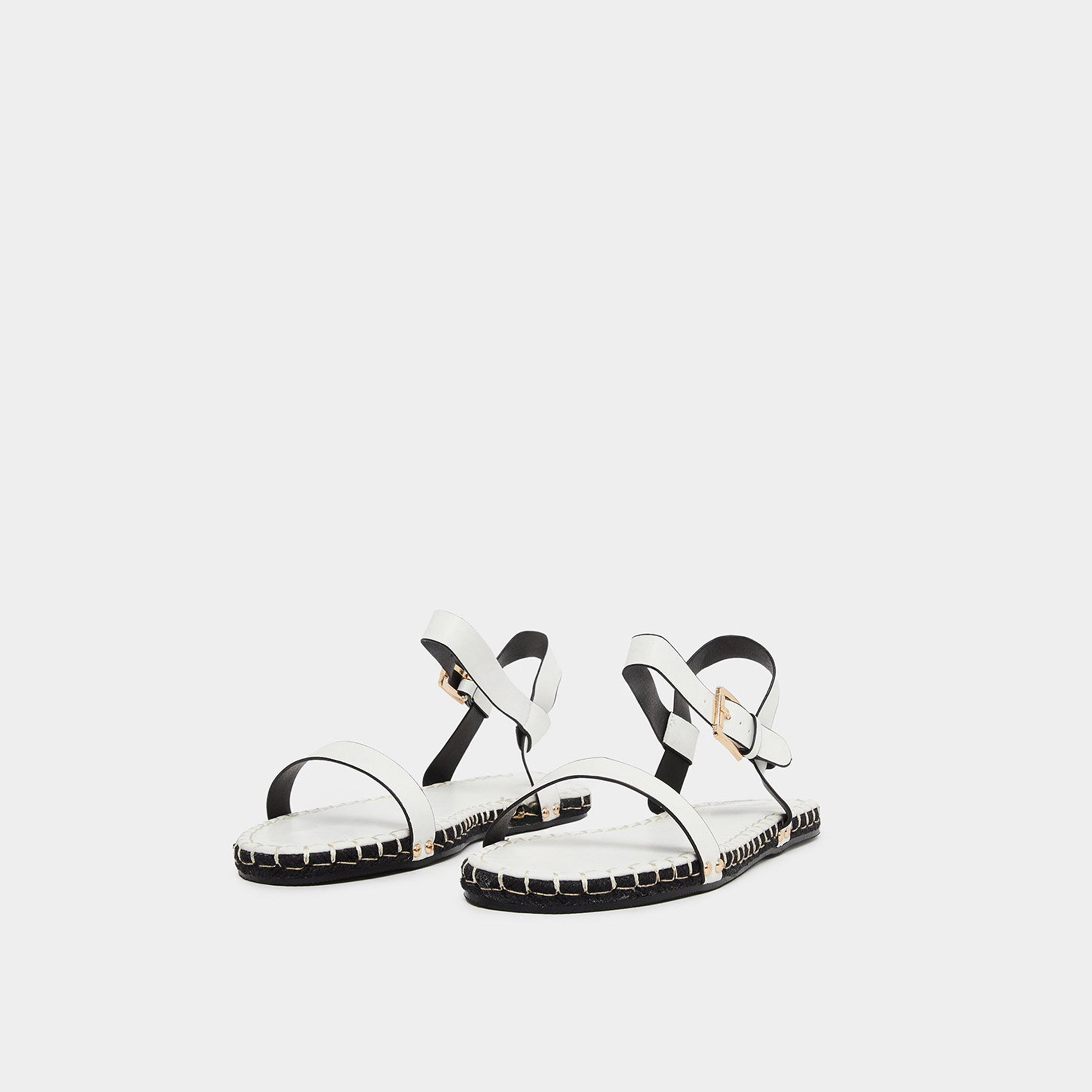 رايد - حذاء إسبادريل مسطح بامبي أبيض بحزام للكاحل-women-shoes-sandals-flats-image-1