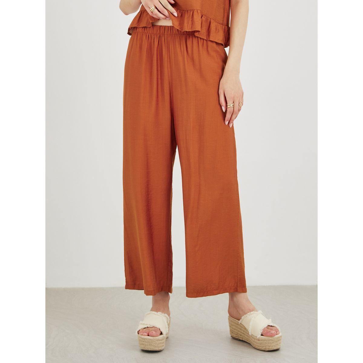 طقم منسق من بنطال وبلوزة بدون أكمام-women-clothing-coordsets-image-5