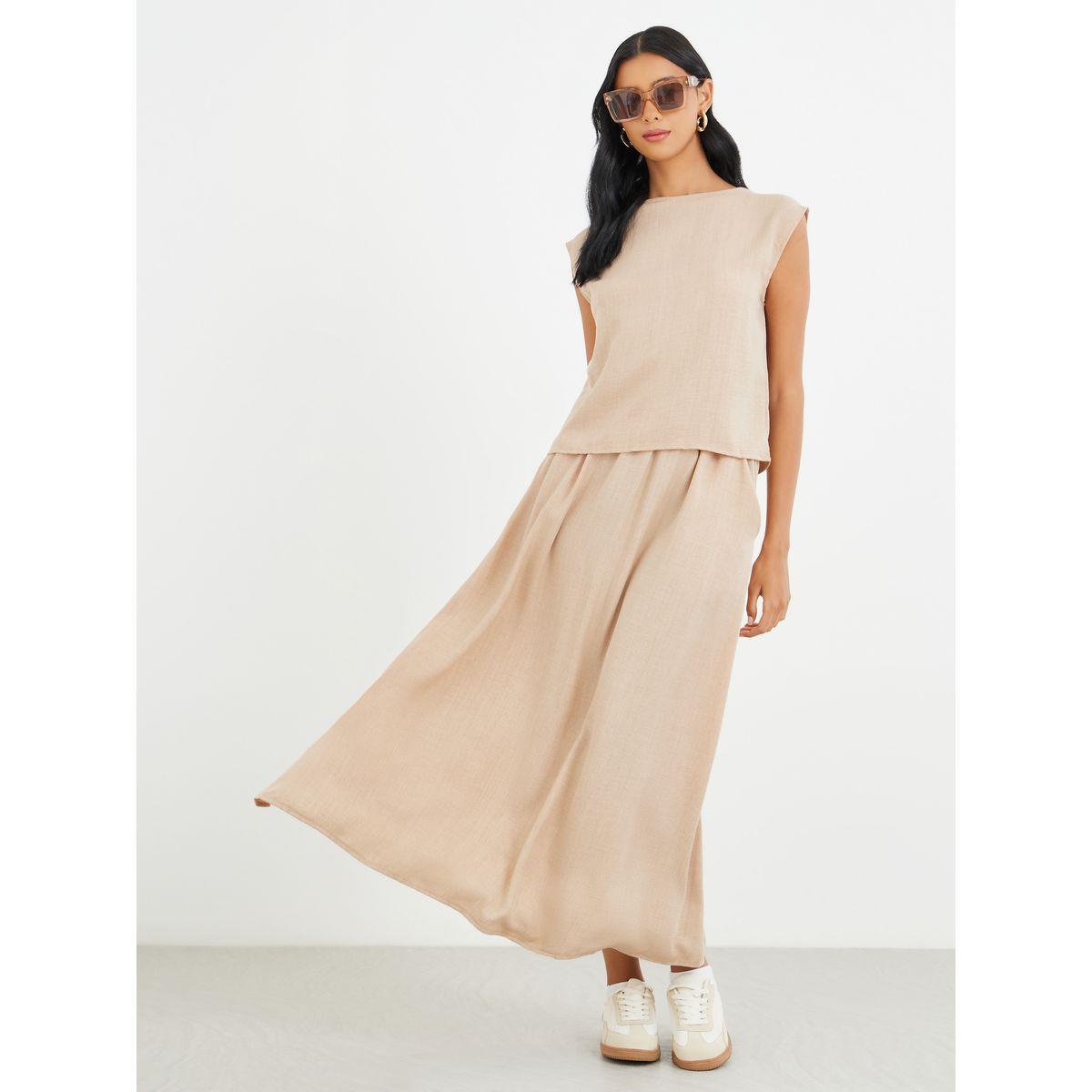 طقم منسق من تنورة ميدي وبلوزة سادة بلا أكمام-women-clothing-coordsets-image-1