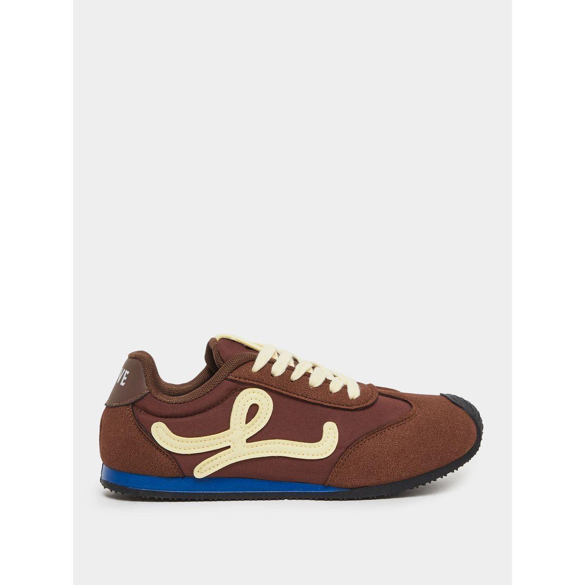 حذاء سنيكرز بشعار الماركة-women-shoes-sneakers-image-1