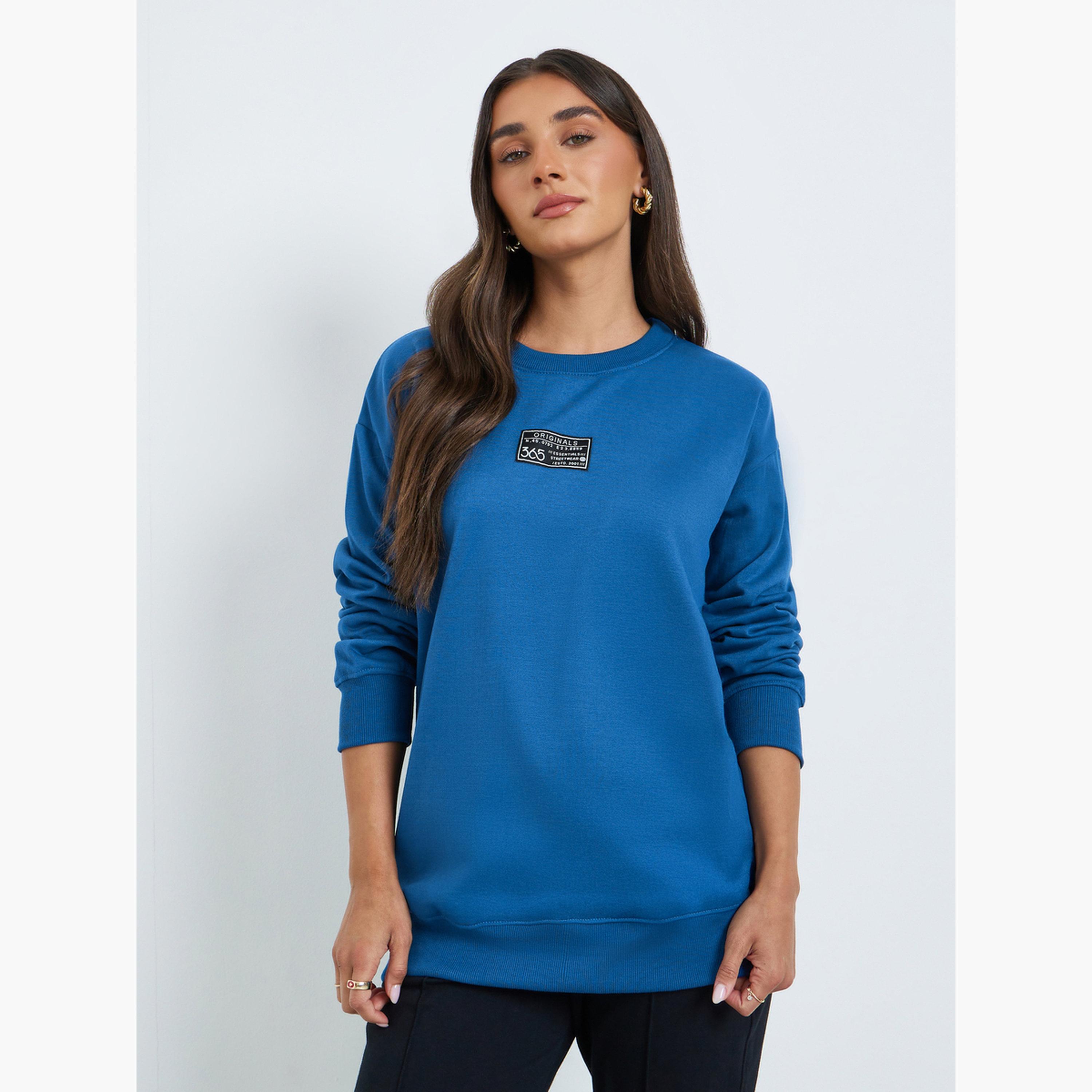 سويت شيرت بقصة واسعة ومزين بشارة-women-clothing-hoodiesandsweatshirts-sweatshirts-image-1