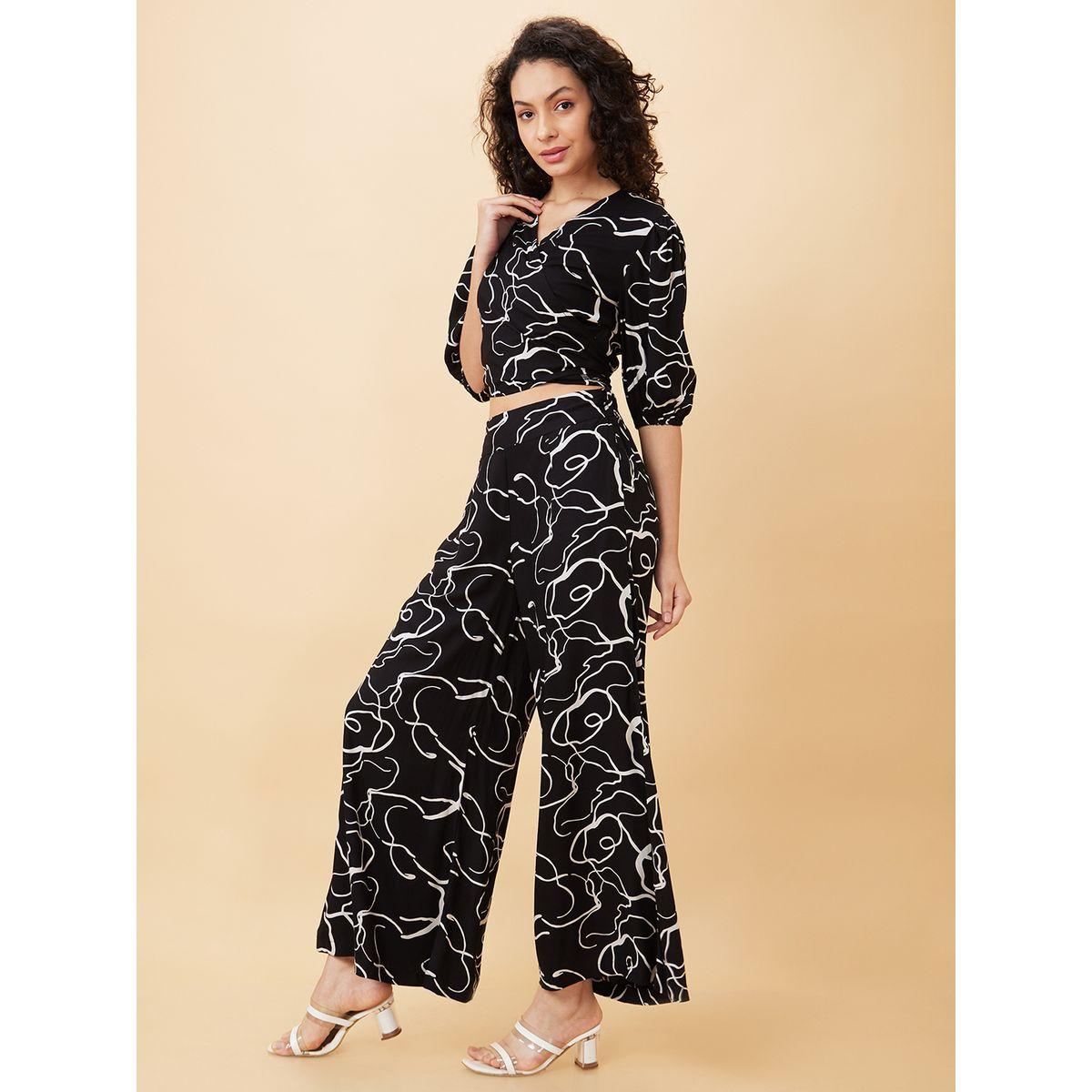 طقم منسق من بنطال بالازو وبلوزة قصيرة مُطبعة-women-clothing-coordsets-image-4