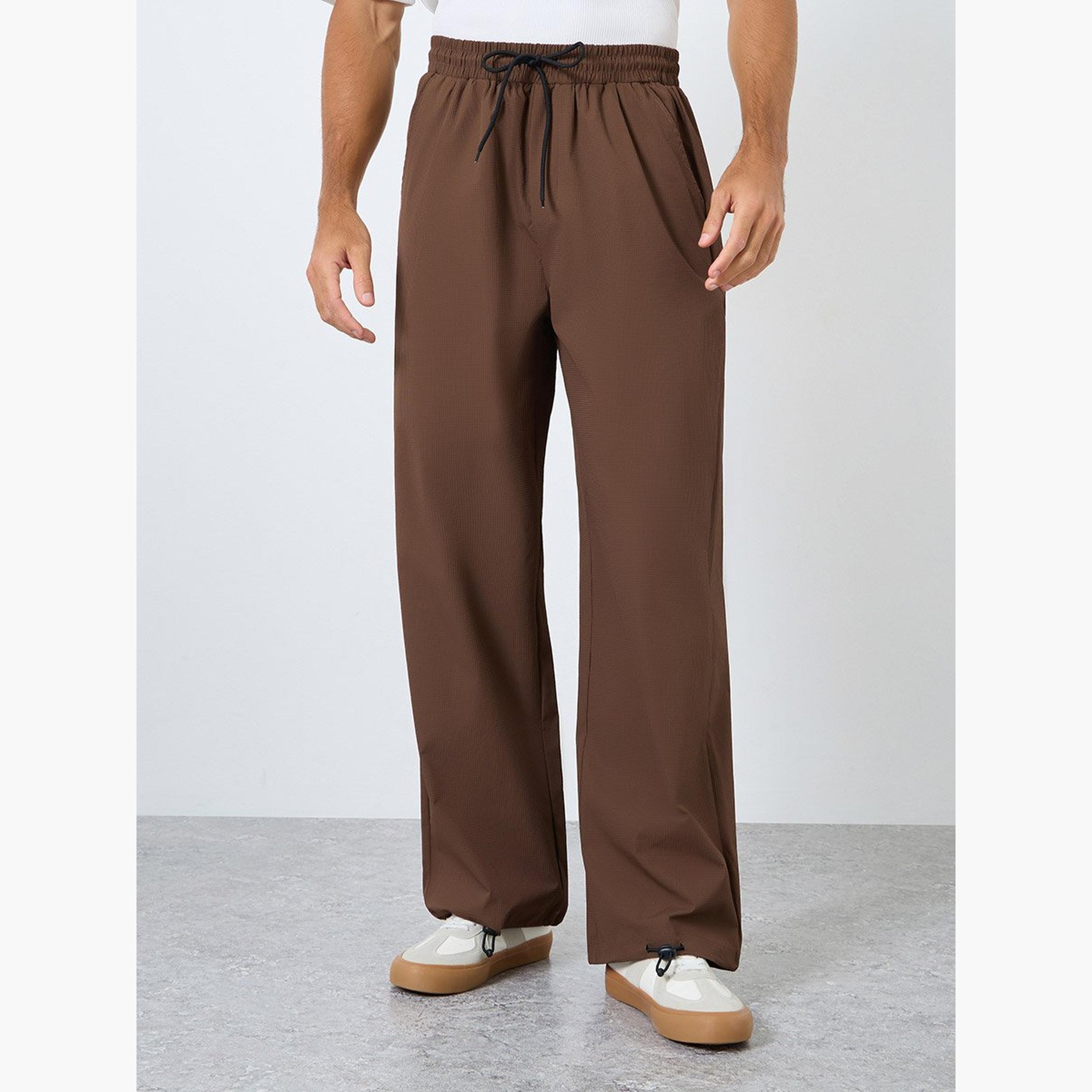 Styli Oversized Parachute Pants with Drawstring-men-clothing-bottoms-trousersandchinos-trousers-image-1