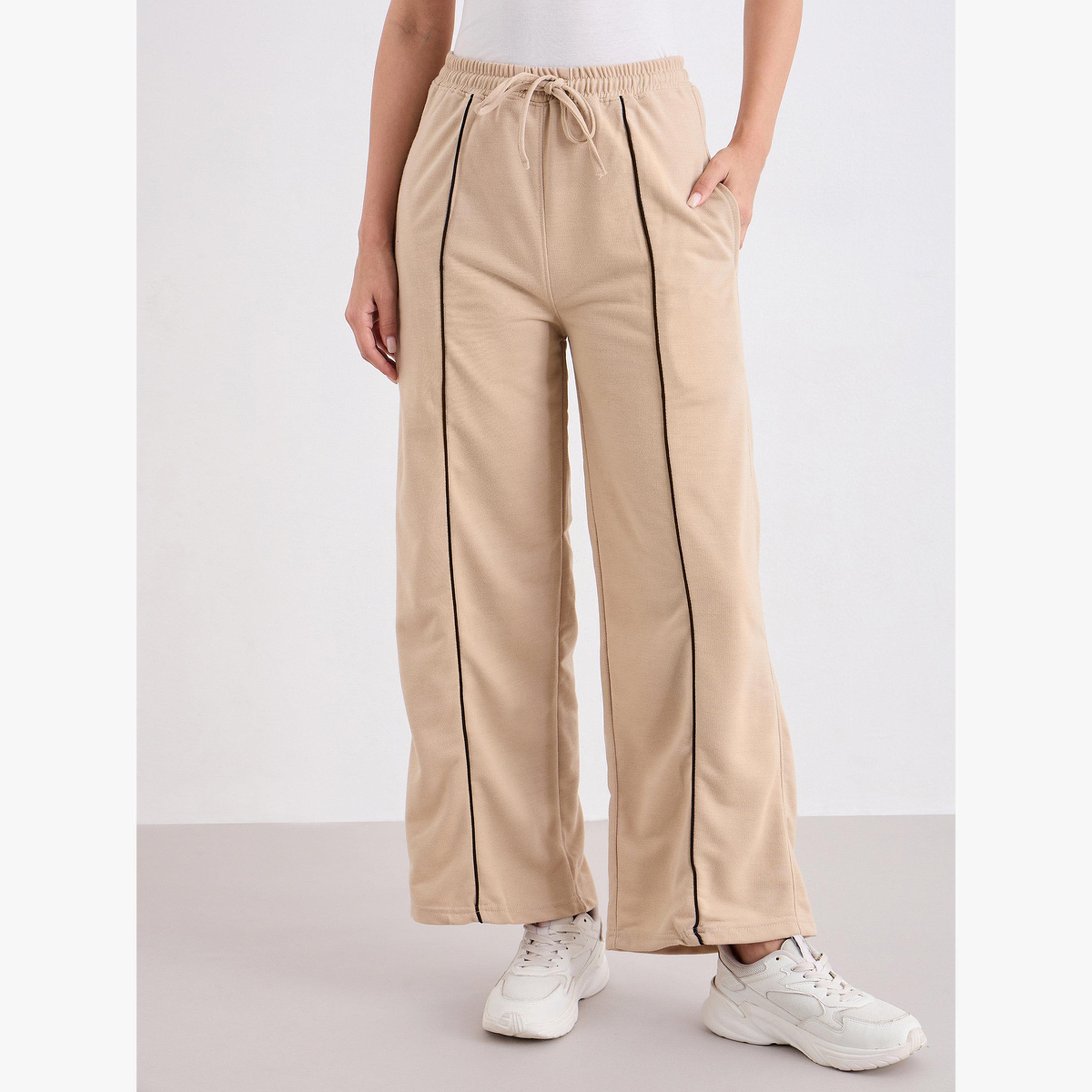 جوغر بأرجل واسعة وتفاصيل محزوزة-women-clothing-bottoms-joggers-image-1