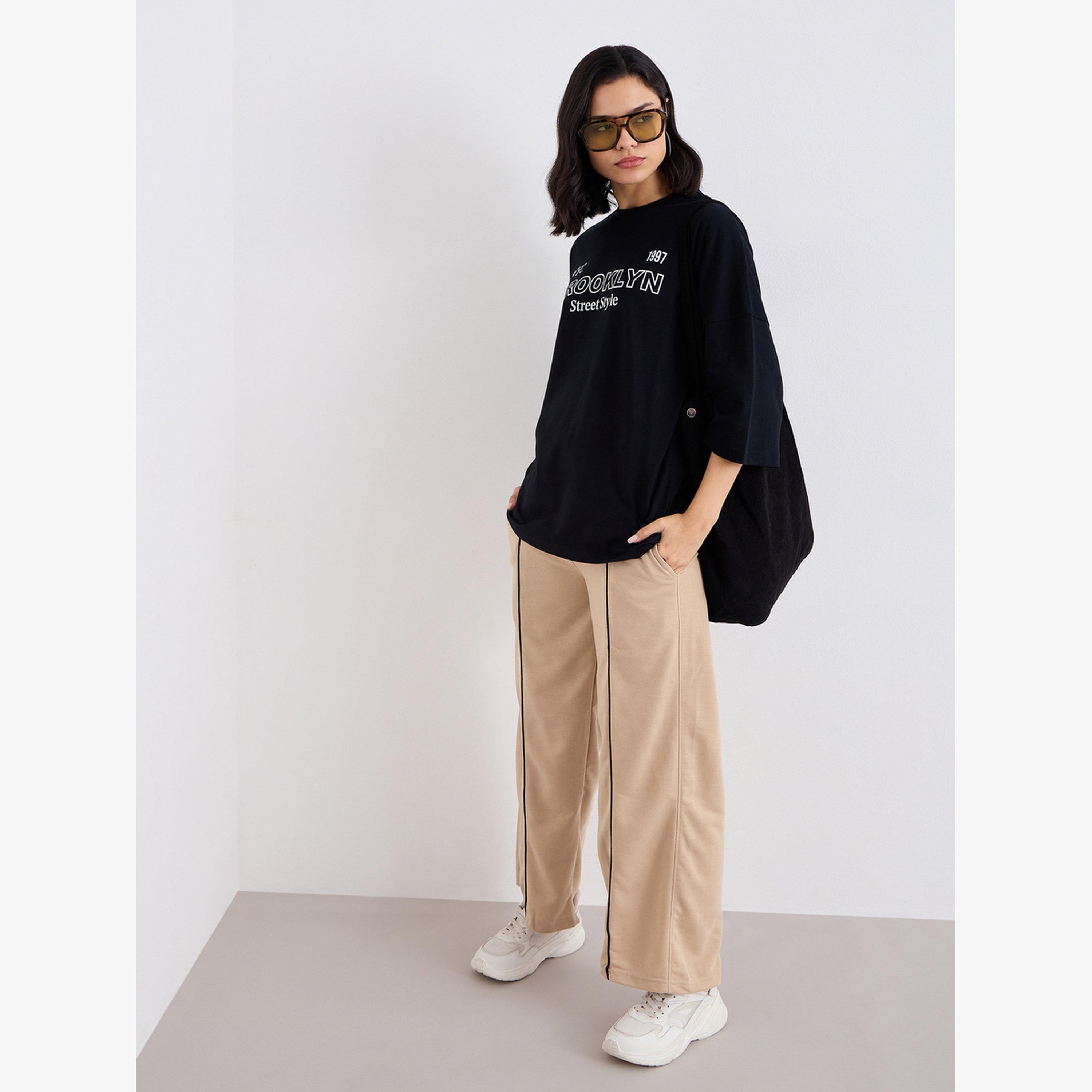 جوغر بأرجل واسعة وتفاصيل محزوزة-women-clothing-bottoms-joggers-image-2