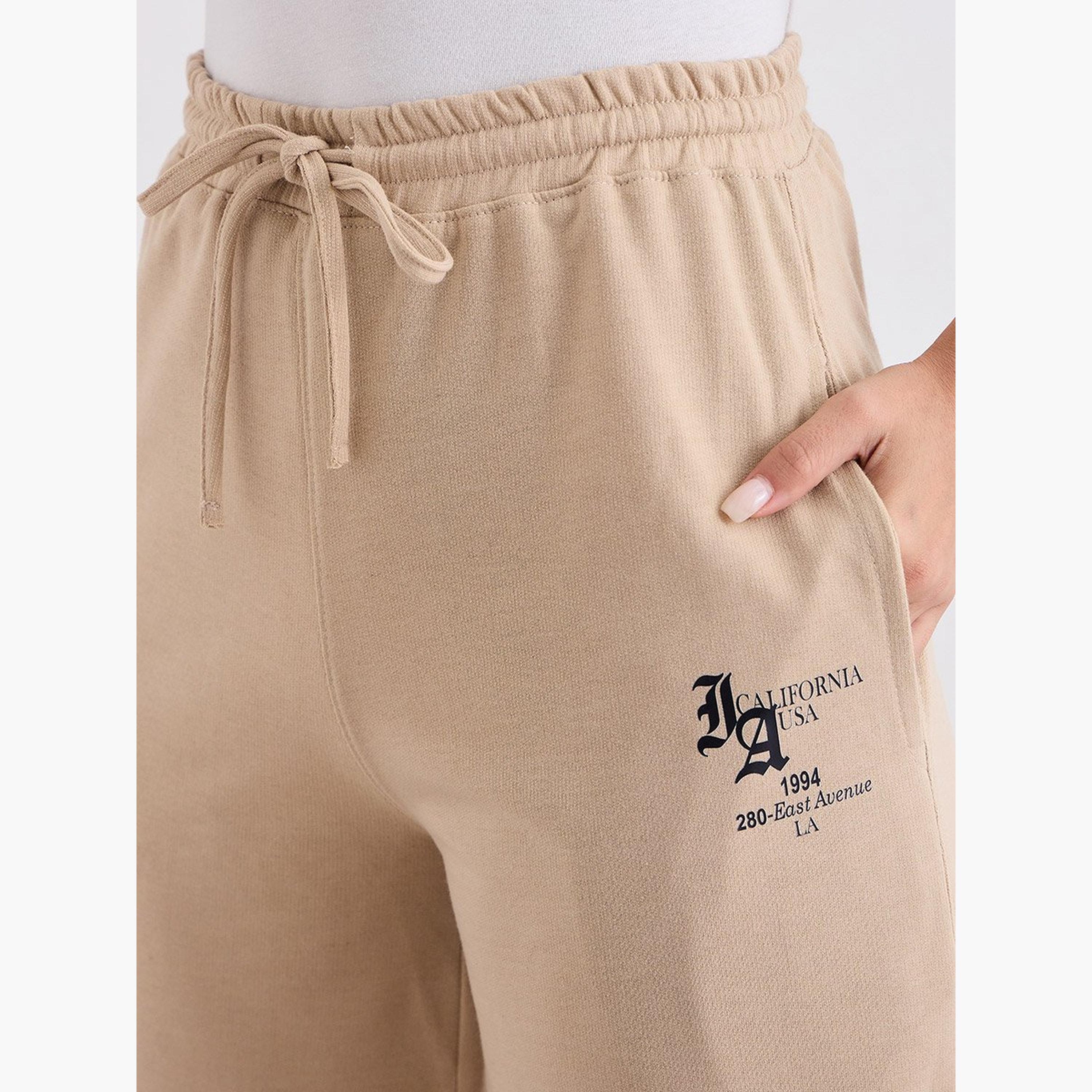 ستايلي - بنطال رياضي واسع الساق لون بيج مع رباط-women-clothing-bottoms-joggers-image-3
