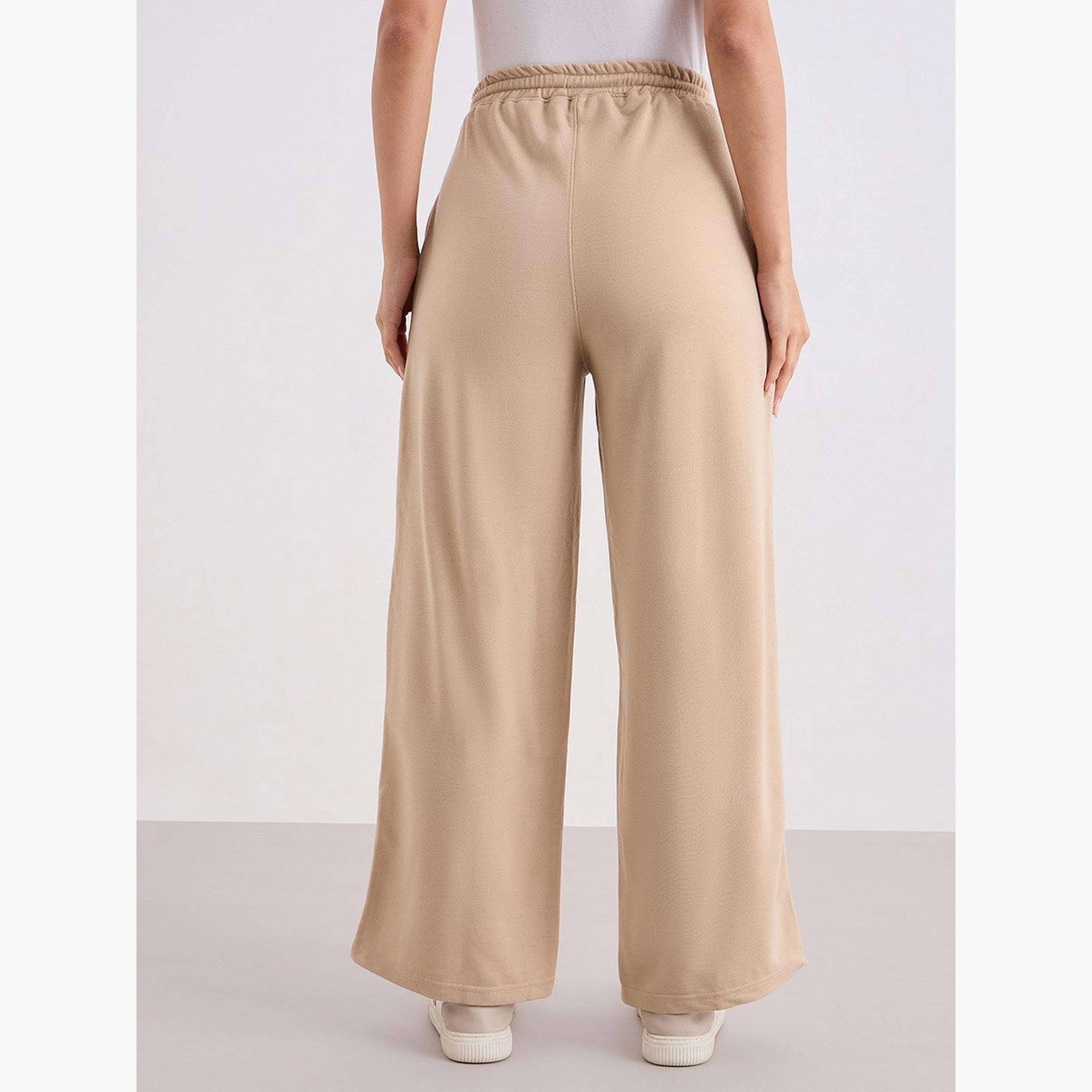 ستايلي - بنطال رياضي واسع الساق لون بيج مع رباط-women-clothing-bottoms-joggers-image-4