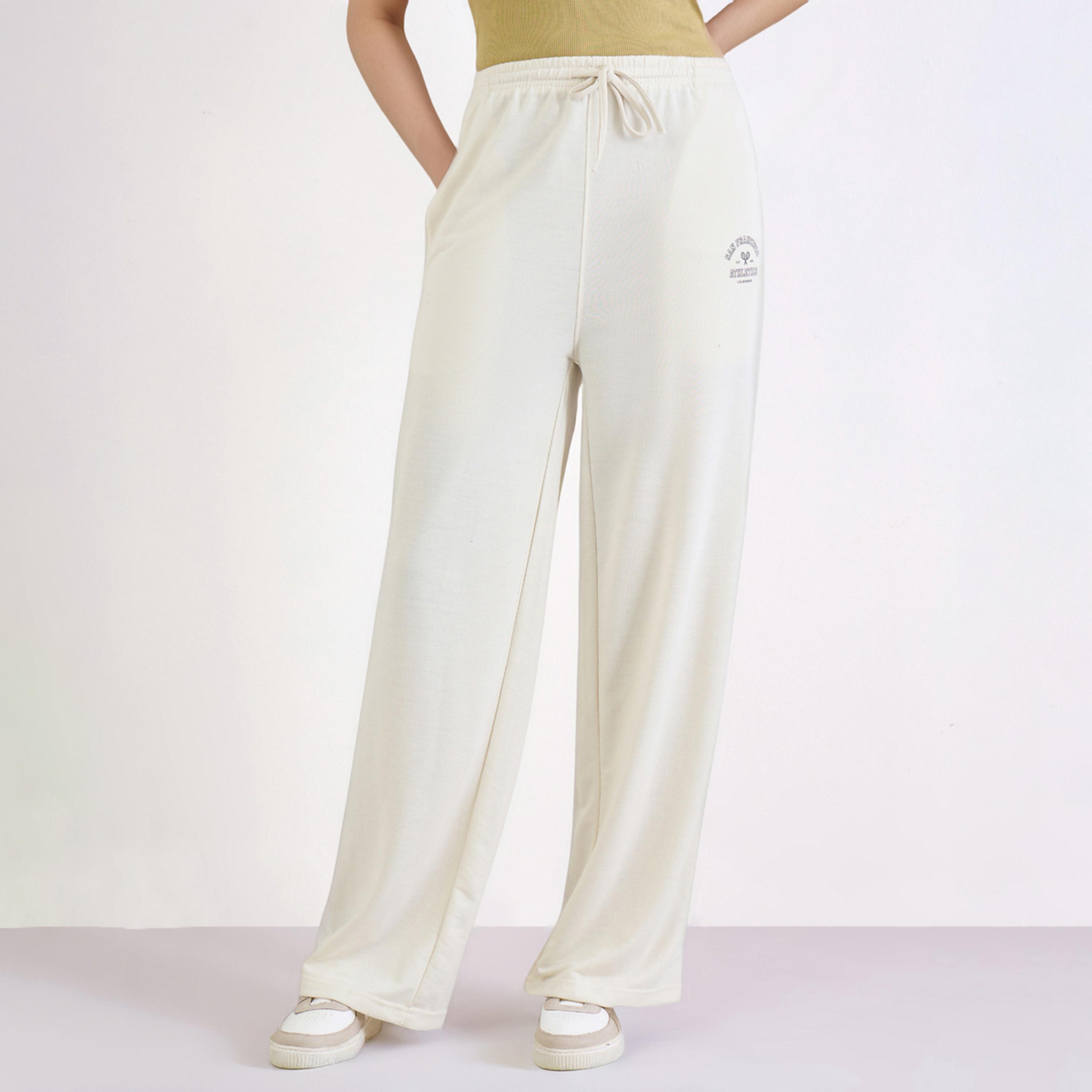 ستايلي - بنطال رياضي واسع الساق بطبعات كريمي-women-clothing-bottoms-joggers-image-1