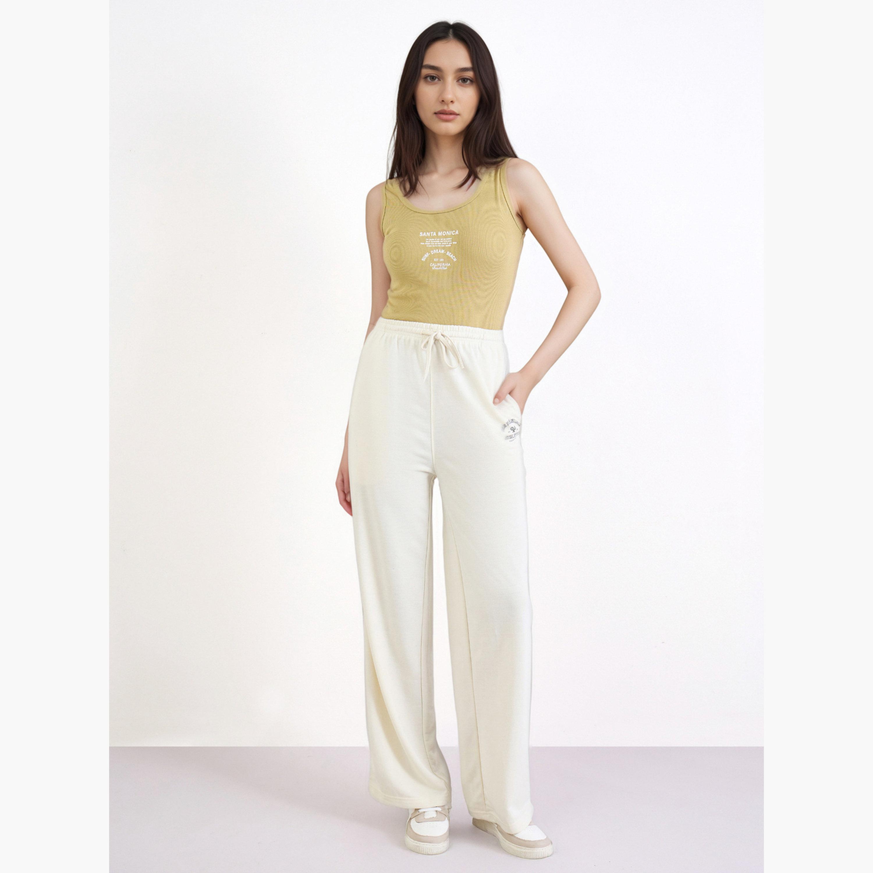ستايلي - بنطال رياضي واسع الساق بطبعات كريمي-women-clothing-bottoms-joggers-image-2