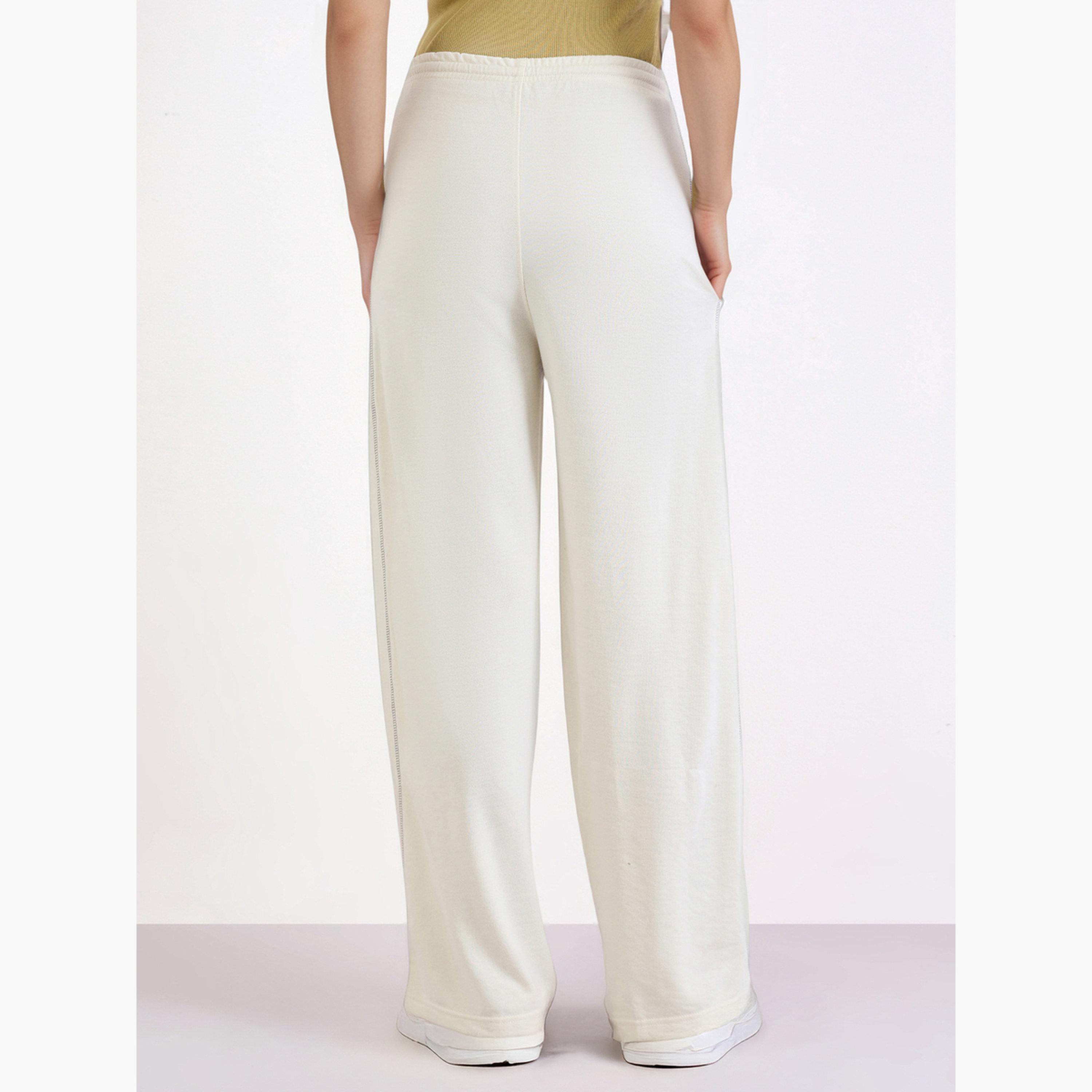 ستايلي - بنطال رياضي واسع الساق بطبعات كريمي-women-clothing-bottoms-joggers-image-4