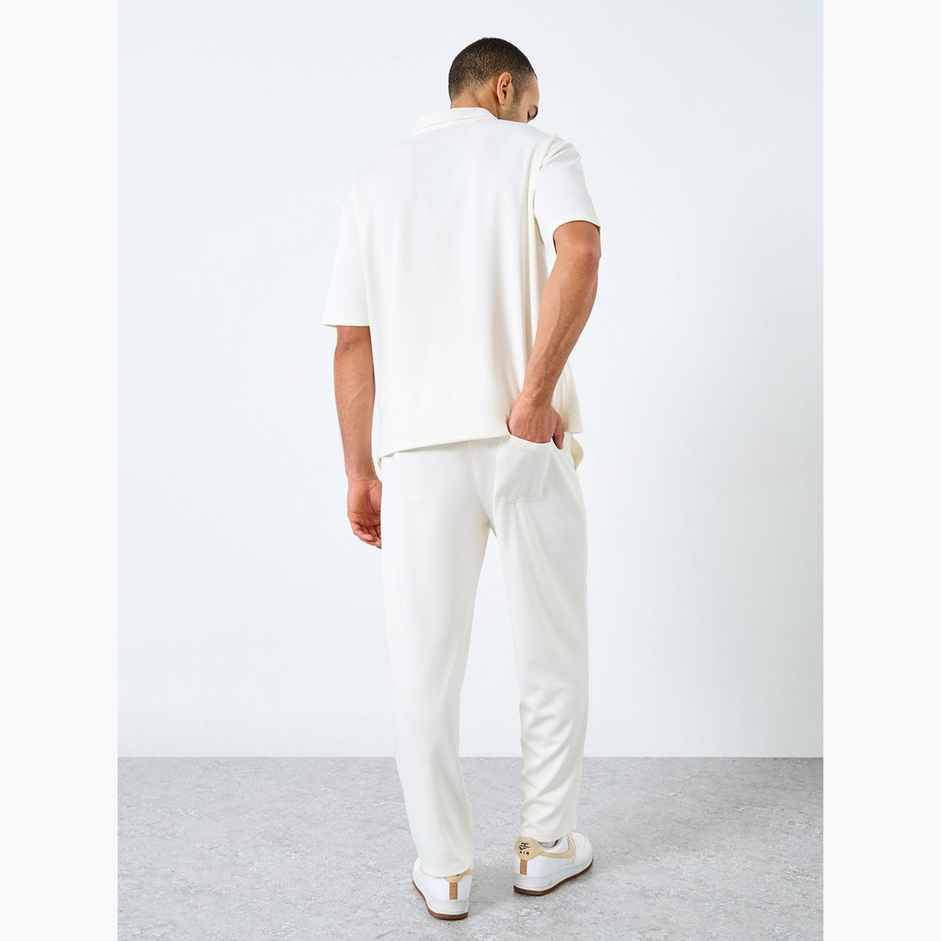 ستايلي - قميص بولو مطرز مقاس كبير وبنطال رياضي قصّة مريحة-men-clothing-coordsets-image-4