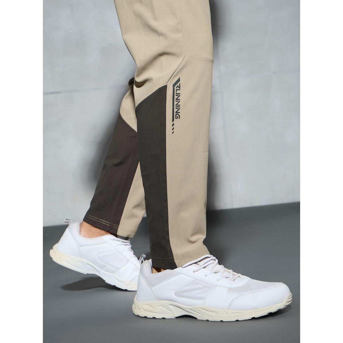 بنطال رياضي بتفاصيل مُتباينة-men-clothing-sportswearandactivewear-bottoms-image-4