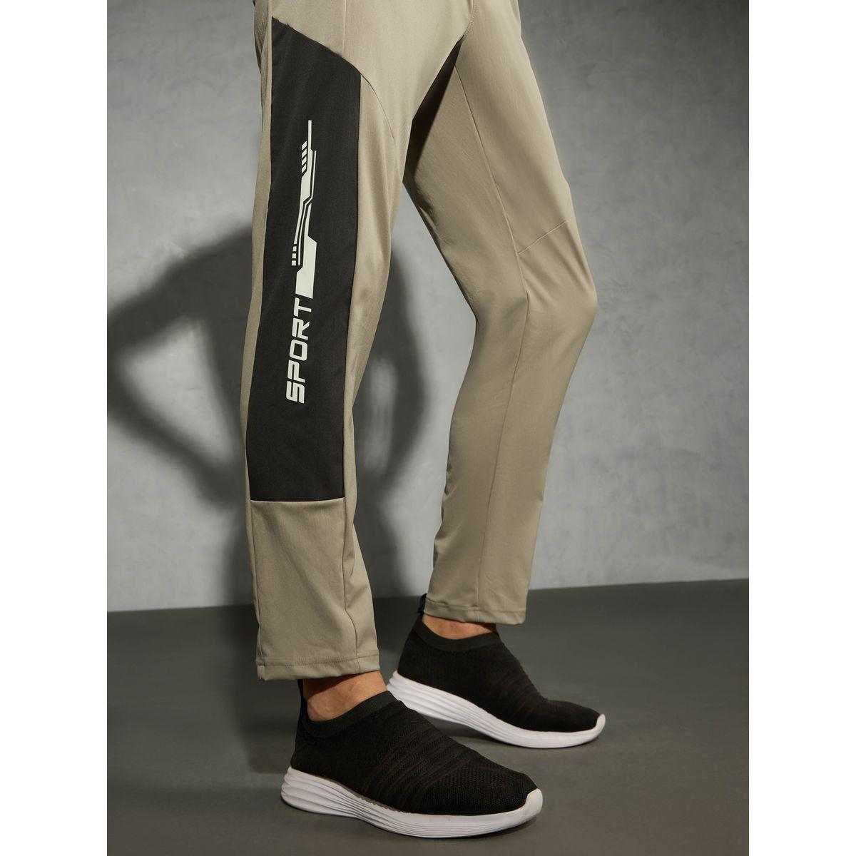 بنطال رياضي بقصة مريحة-men-clothing-bottoms-joggers-image-5