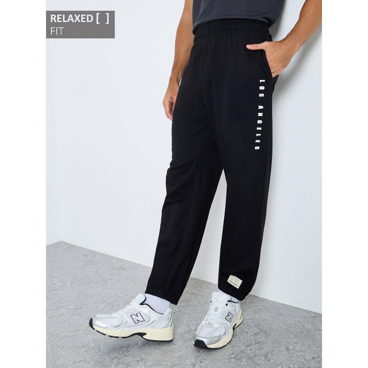 Styli Relaxed Fit Slogan Print Joggers-men-clothing-bottoms-joggers-image-1