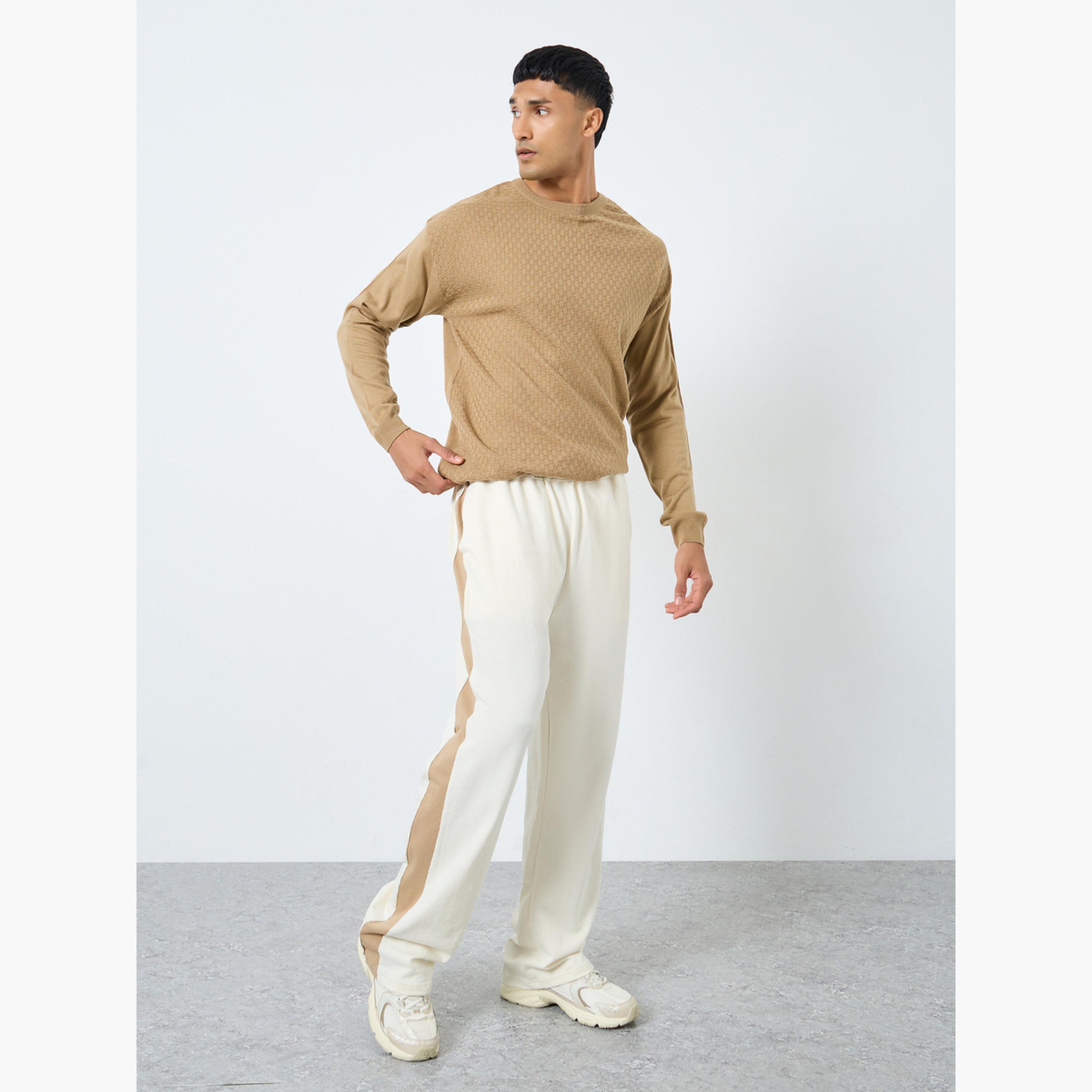 ستايلي - بنطال رياضي حجم كبير ذو لوحة جانبية لون كريمي-men-clothing-bottoms-joggers-image-2