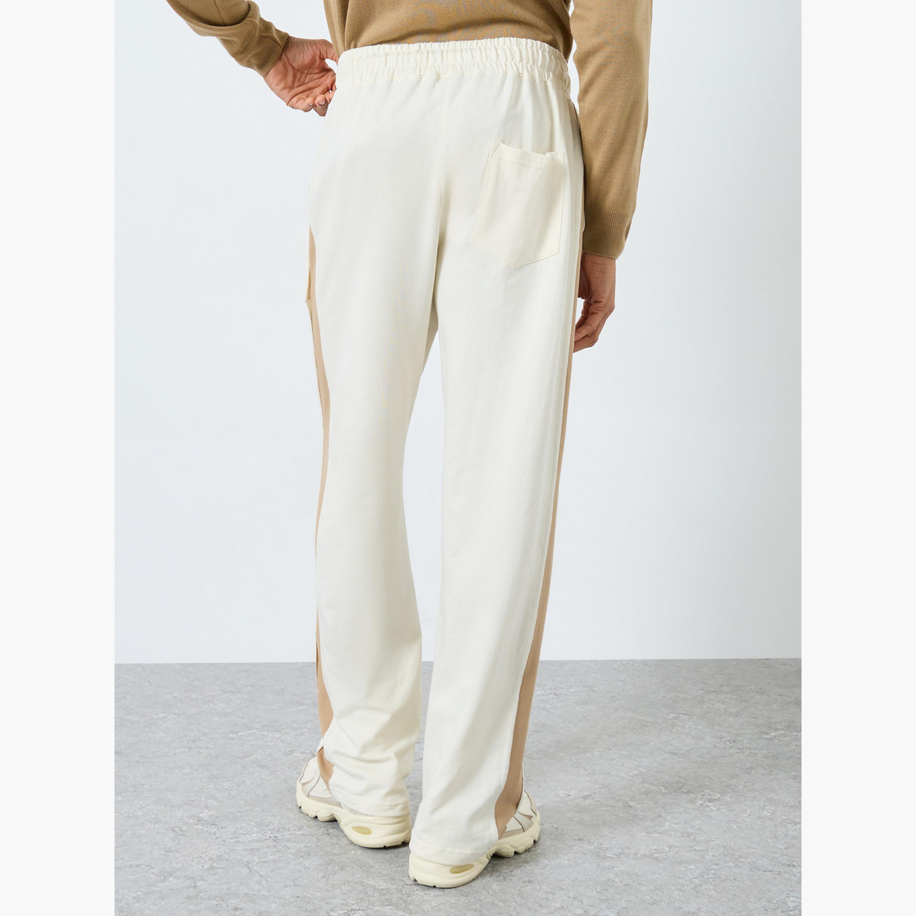 ستايلي - بنطال رياضي حجم كبير ذو لوحة جانبية لون كريمي-men-clothing-bottoms-joggers-image-4