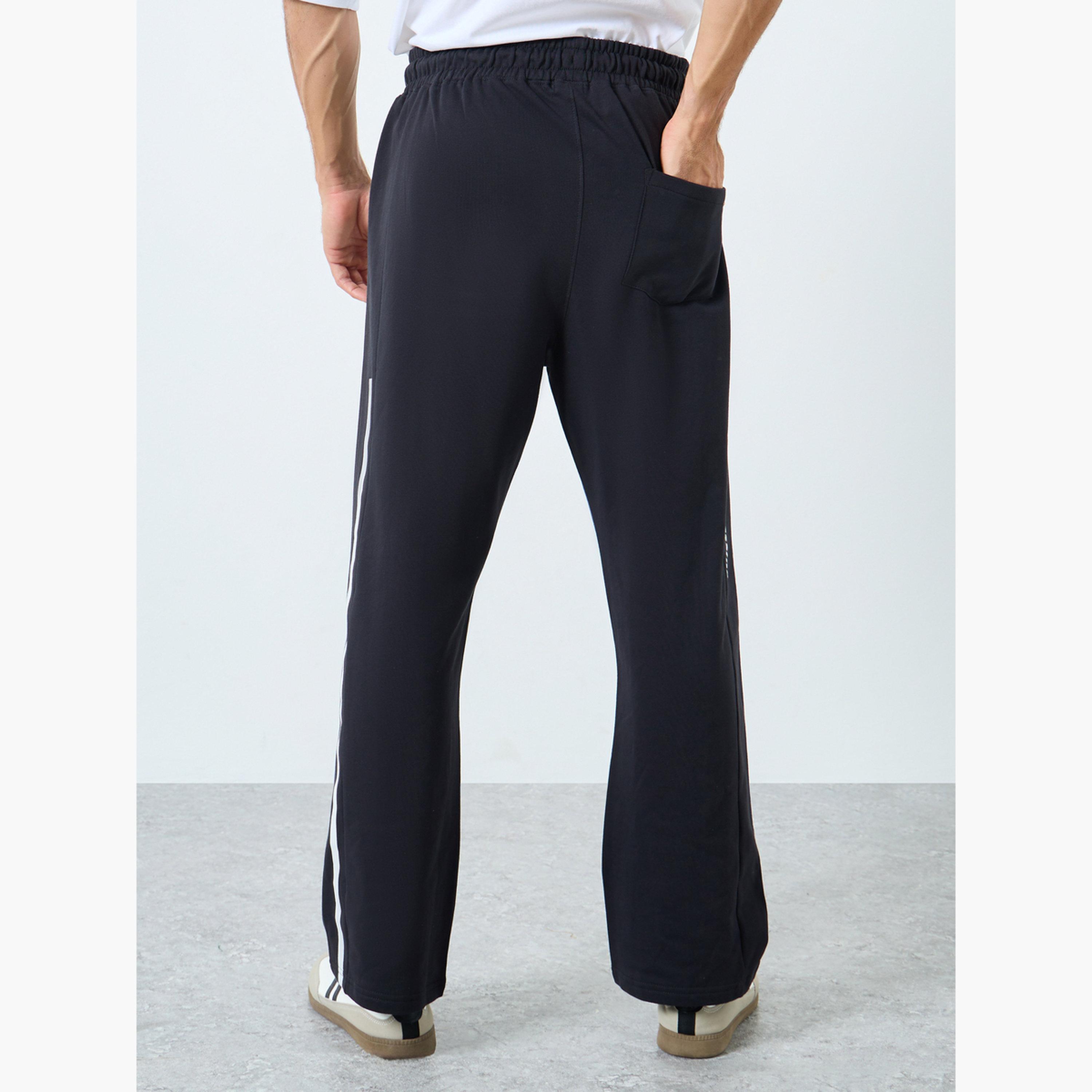 ستايلي - بنطال رياضي رجالي أسود مقاس كبير اوفر سايز  مطبوع عليه شعار-men-clothing-bottoms-joggers-image-3