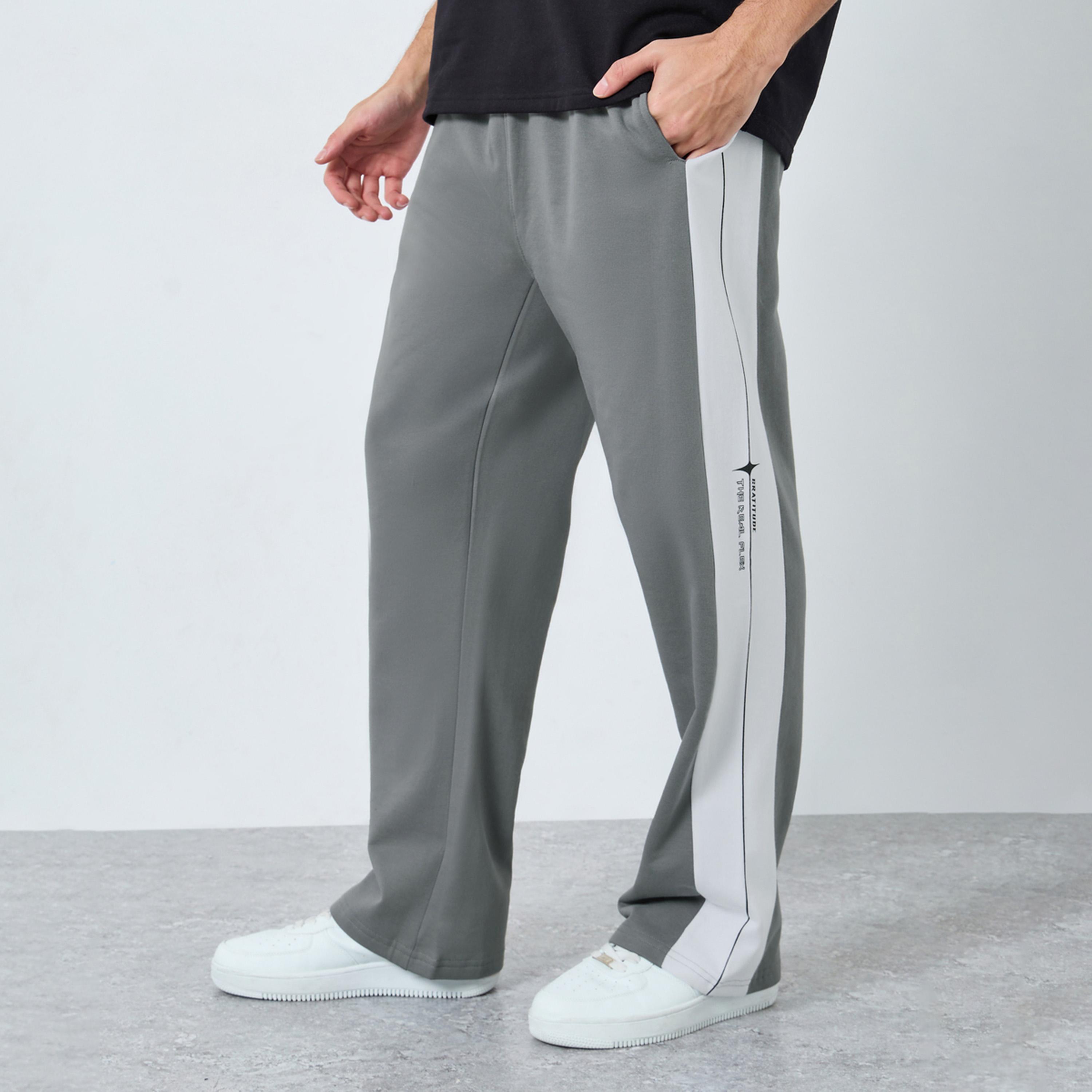 ستايلي - بنطال رياضي من الصوف مطبوع عليه لوحة جانبية حجم كبير-men-clothing-bottoms-joggers-image-1