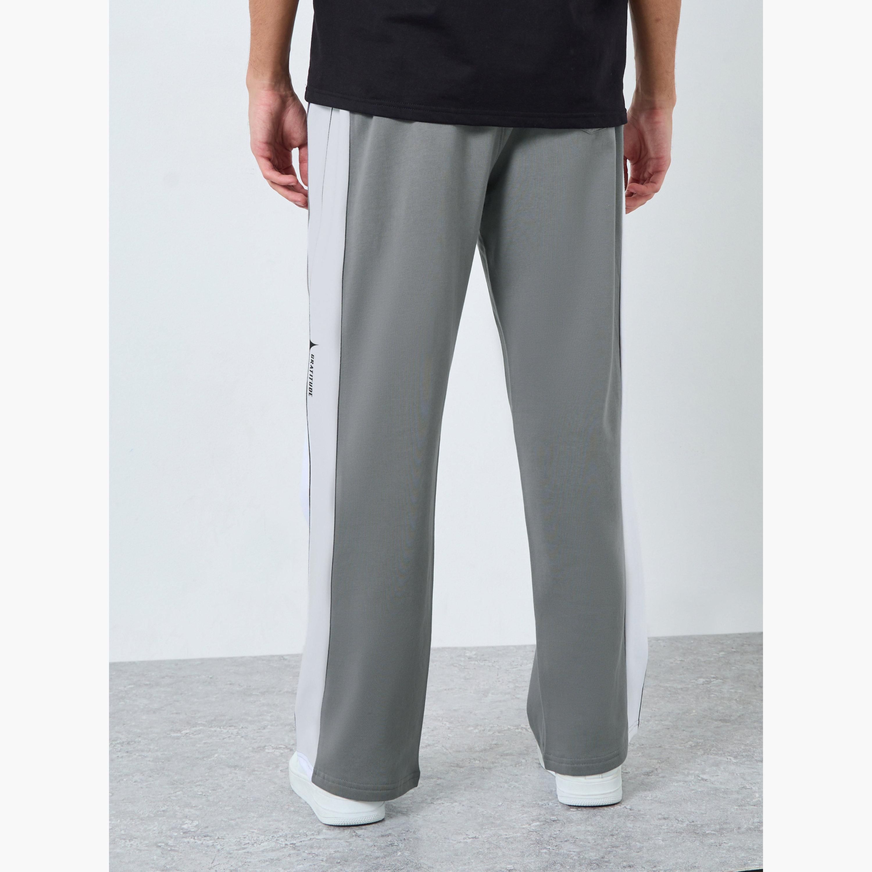 ستايلي - بنطال رياضي من الصوف مطبوع عليه لوحة جانبية حجم كبير-men-clothing-bottoms-joggers-image-4