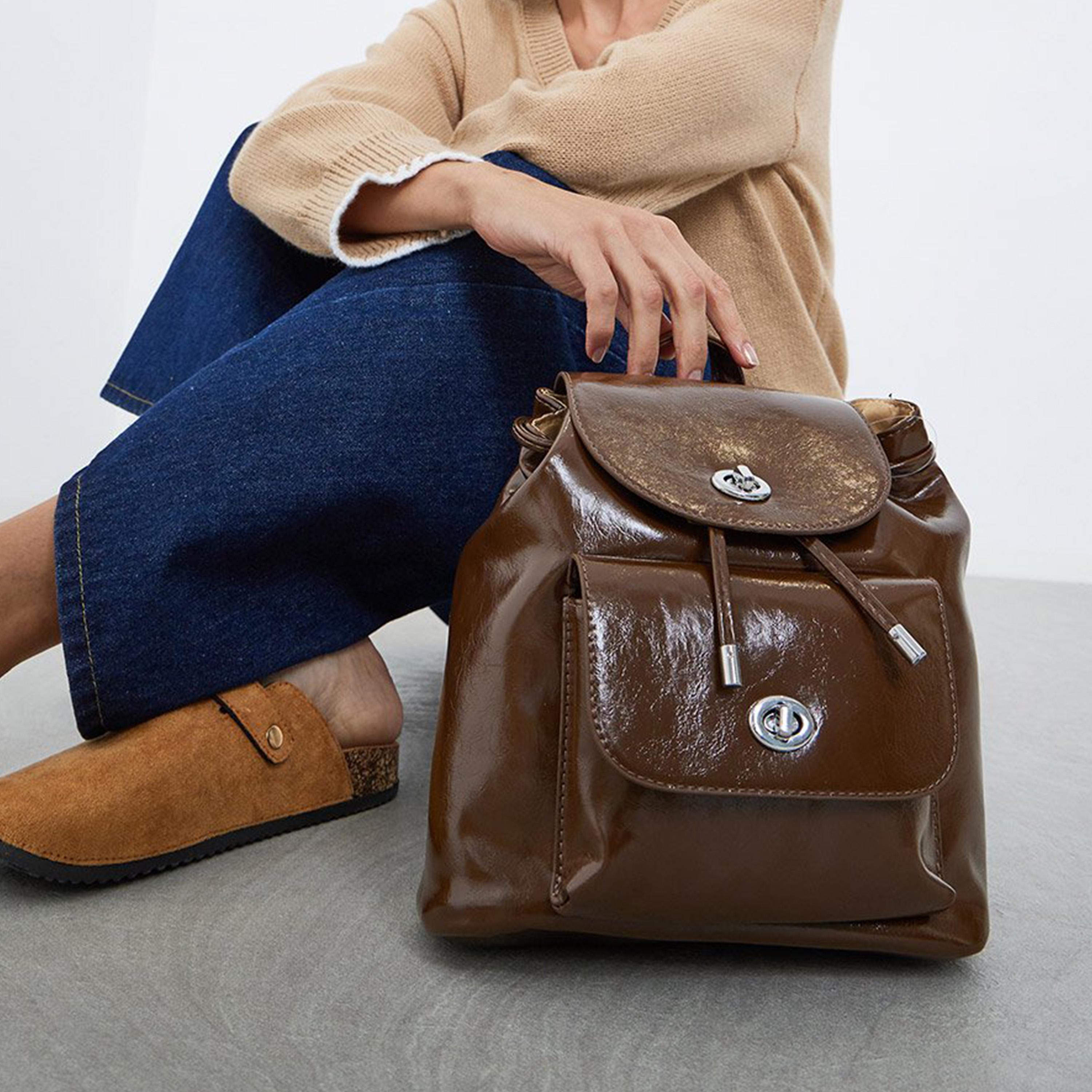 ستايلي - شنطة ظهر بنية اللون مزودة بجيوب جانبية-women-bagsandwallets-backpacks-image-2