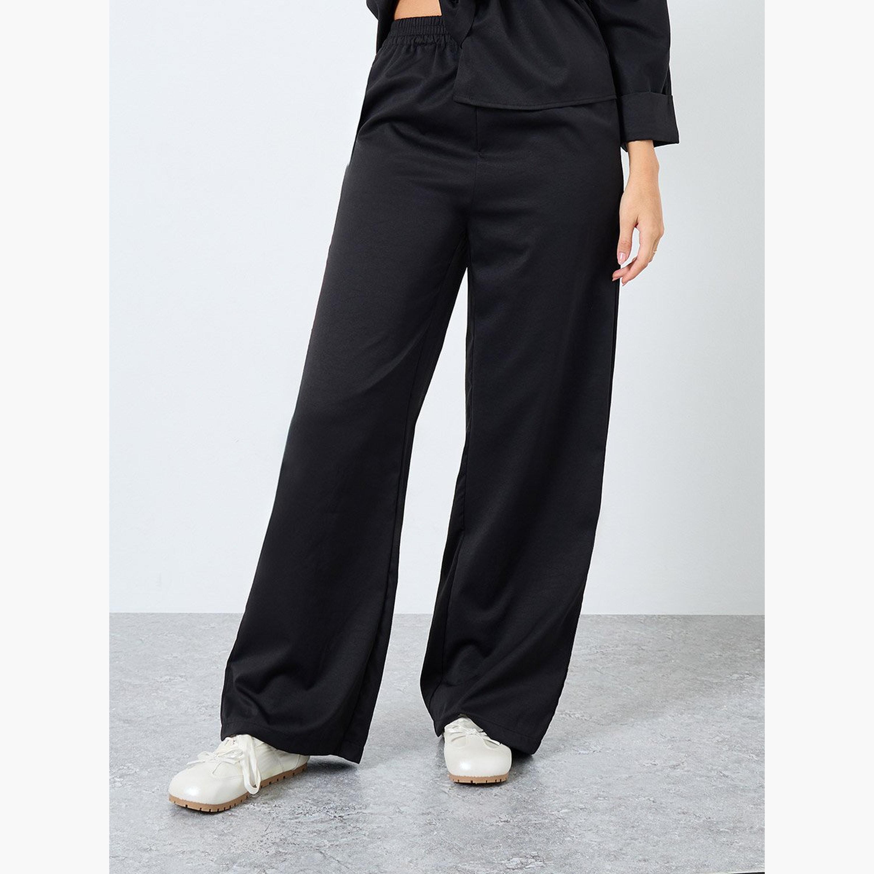 ستايلي - قميص وبنطال أسود بتفاصيل رباط-women-clothing-coordsets-image-4