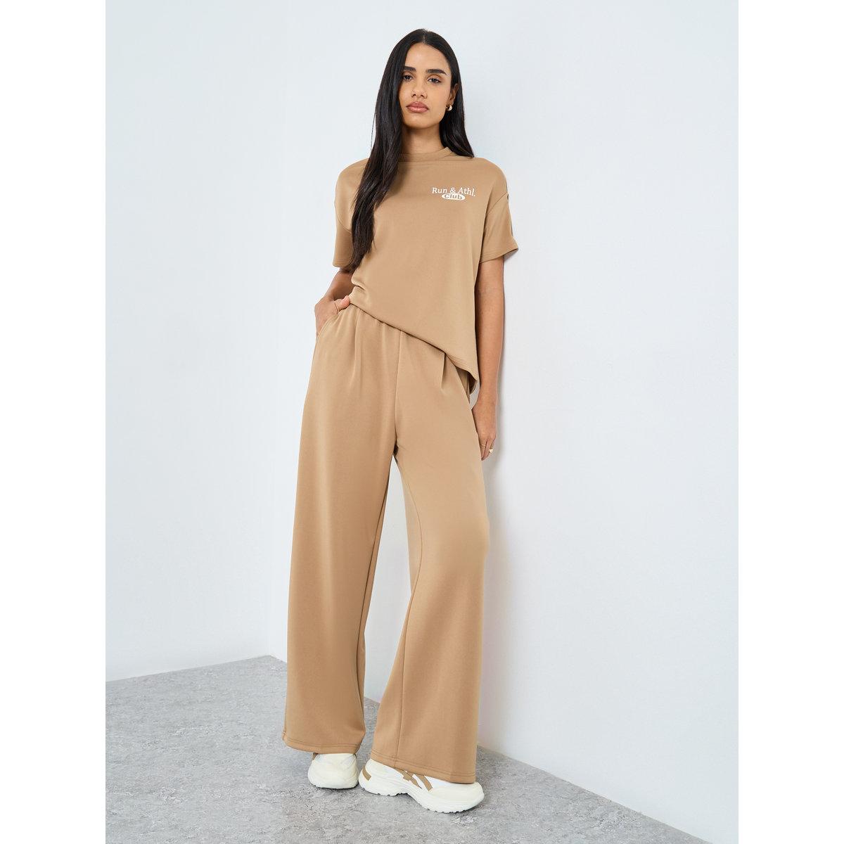 بنطال سادة بقصة أرجل واسعة-women-clothing-bottoms-joggers-image-1