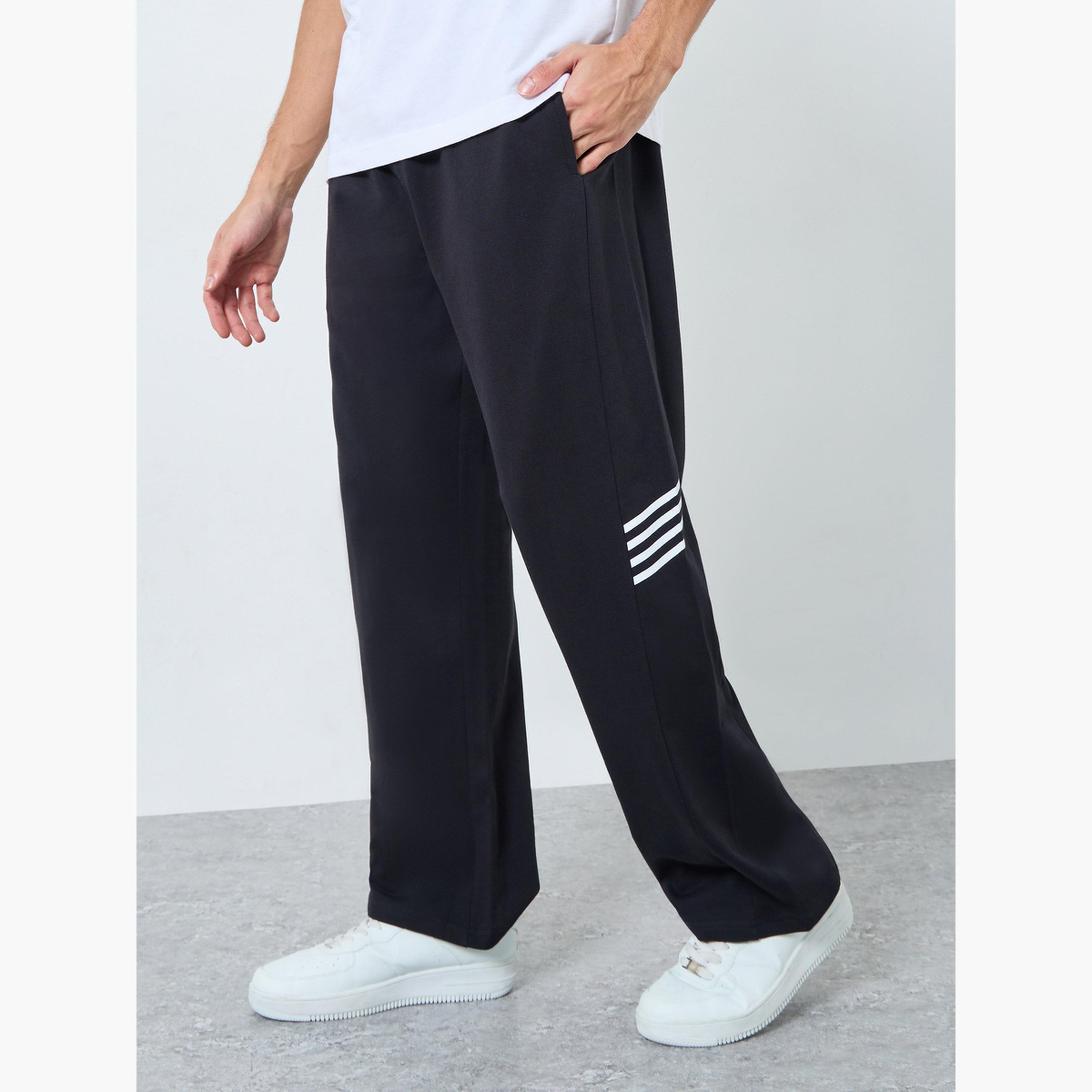 جوغر مخطط بقصة واسعة-men-clothing-bottoms-joggers-image-1
