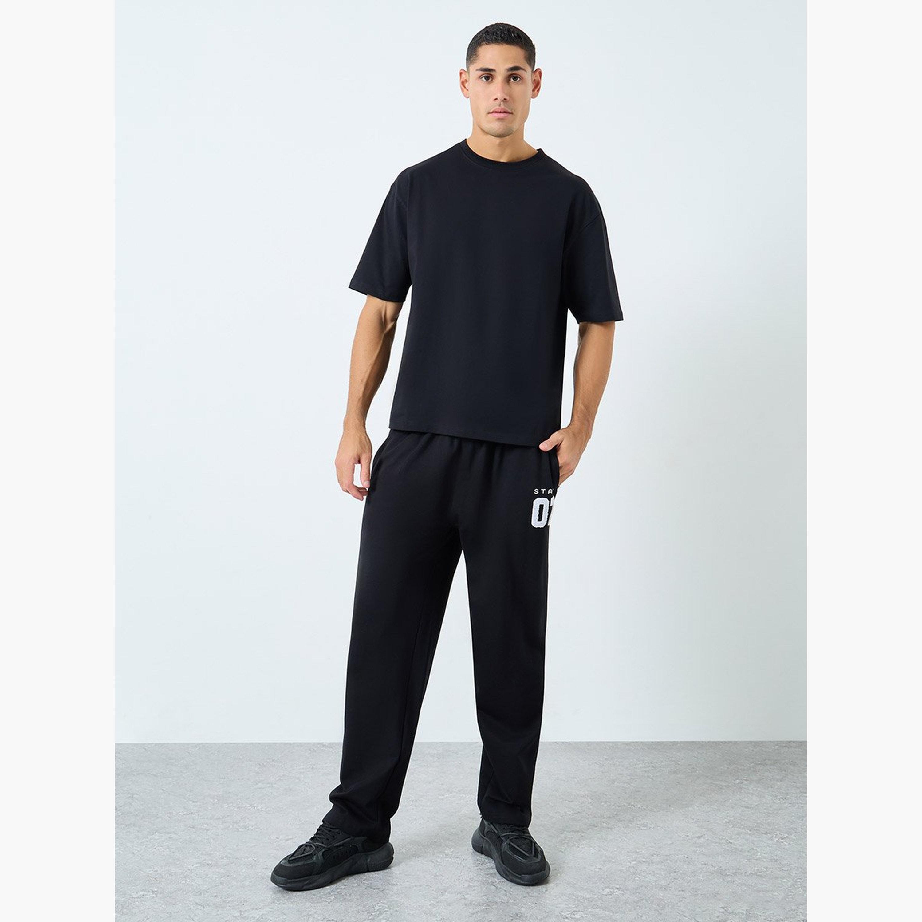 Styli Relaxed Fit Open Hem Joggers with Towel Embroidery-men-clothing-sportswearandactivewear-bottoms-joggers-image-2