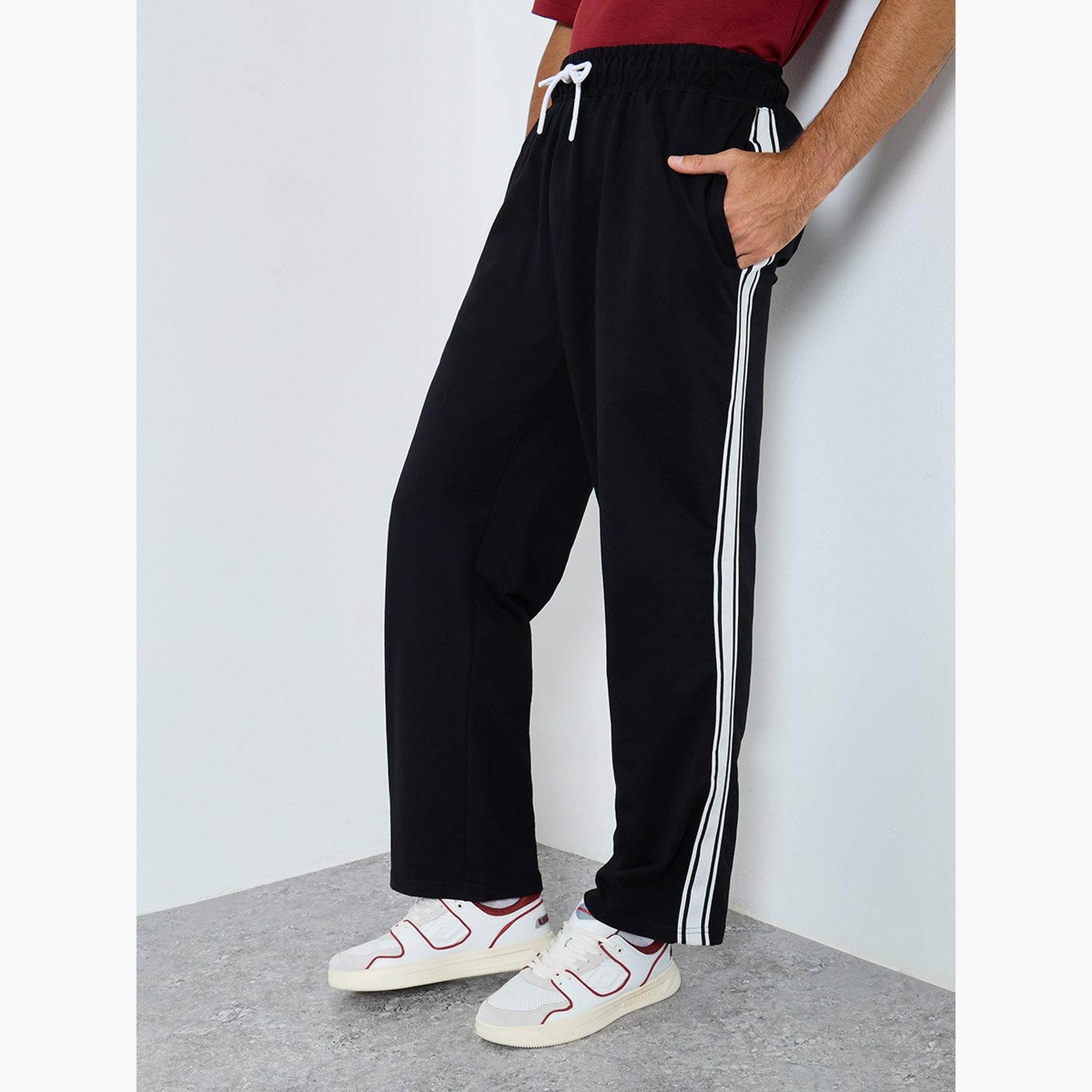 ستايلي - بنطال رياضي للرجال مقاس كبير بشريط جانبي-men-clothing-sportswearandactivewear-bottoms-joggers-image-1